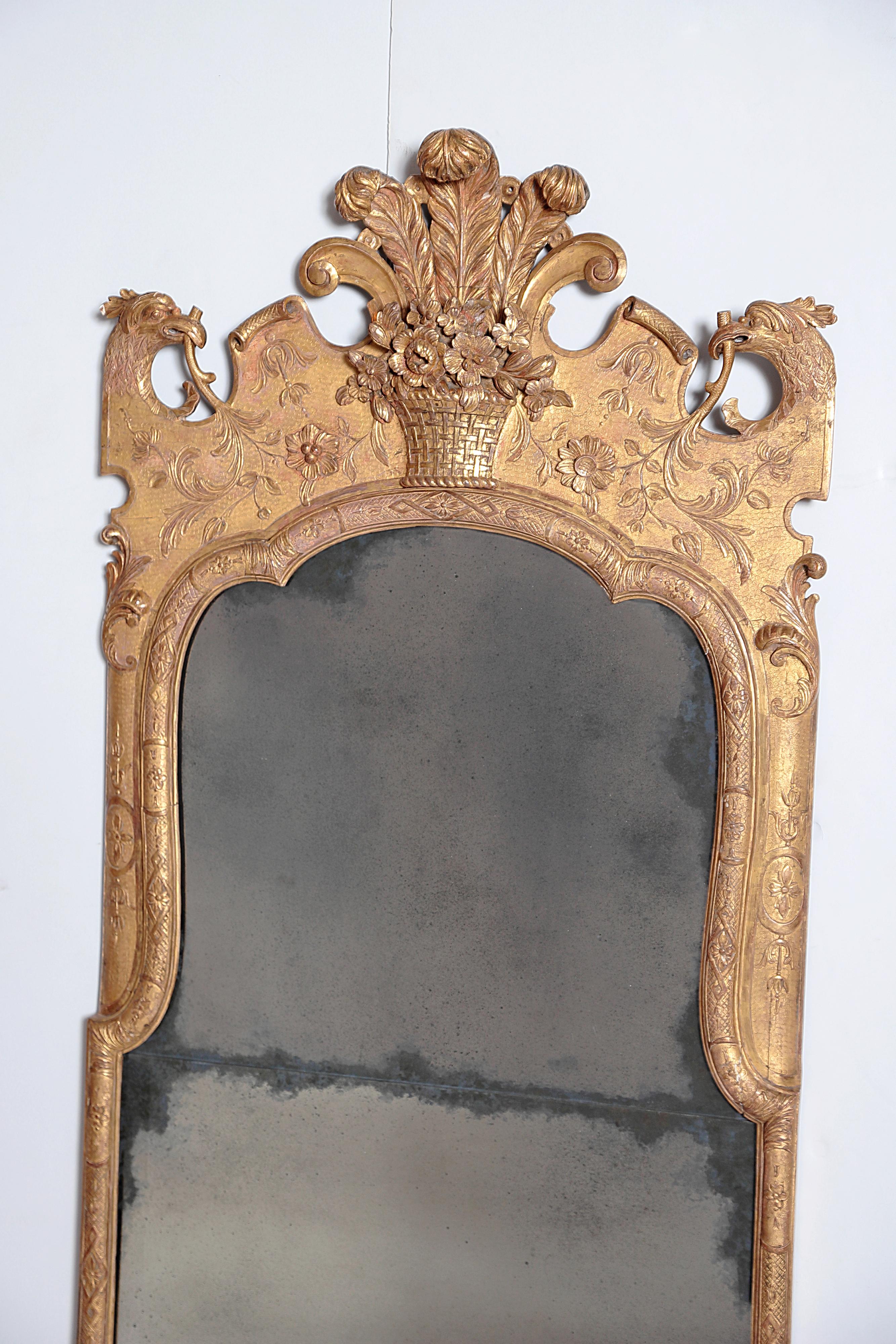 Paper label en verso 
Westing, Evans & Egmore
Cabinet makers
Upholsterers
Philadelphia.

Early 20th century Queen Anne-style pier glass / looking glass / mirror with beautiful gilt frame by a Philadelphia, PA maker, Westing, Evans & Egmore,