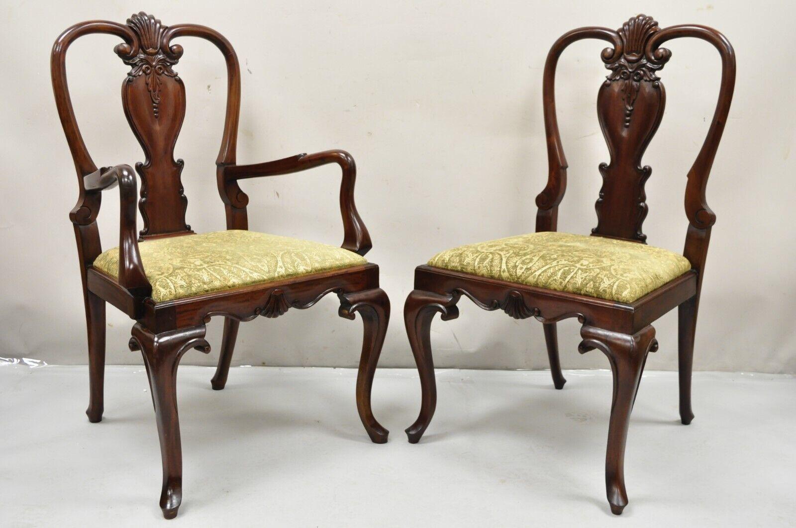 Queen Anne Style Solid Mahogany Carved Fan T-Back Dining Chairs- Set of 12. Item features solid mahogany wood frames, shell carved fan backs, green upholstered seats, very rare set of 12. Circa Late 20th Century.
Measurements: 
2) Armchairs: 41.5