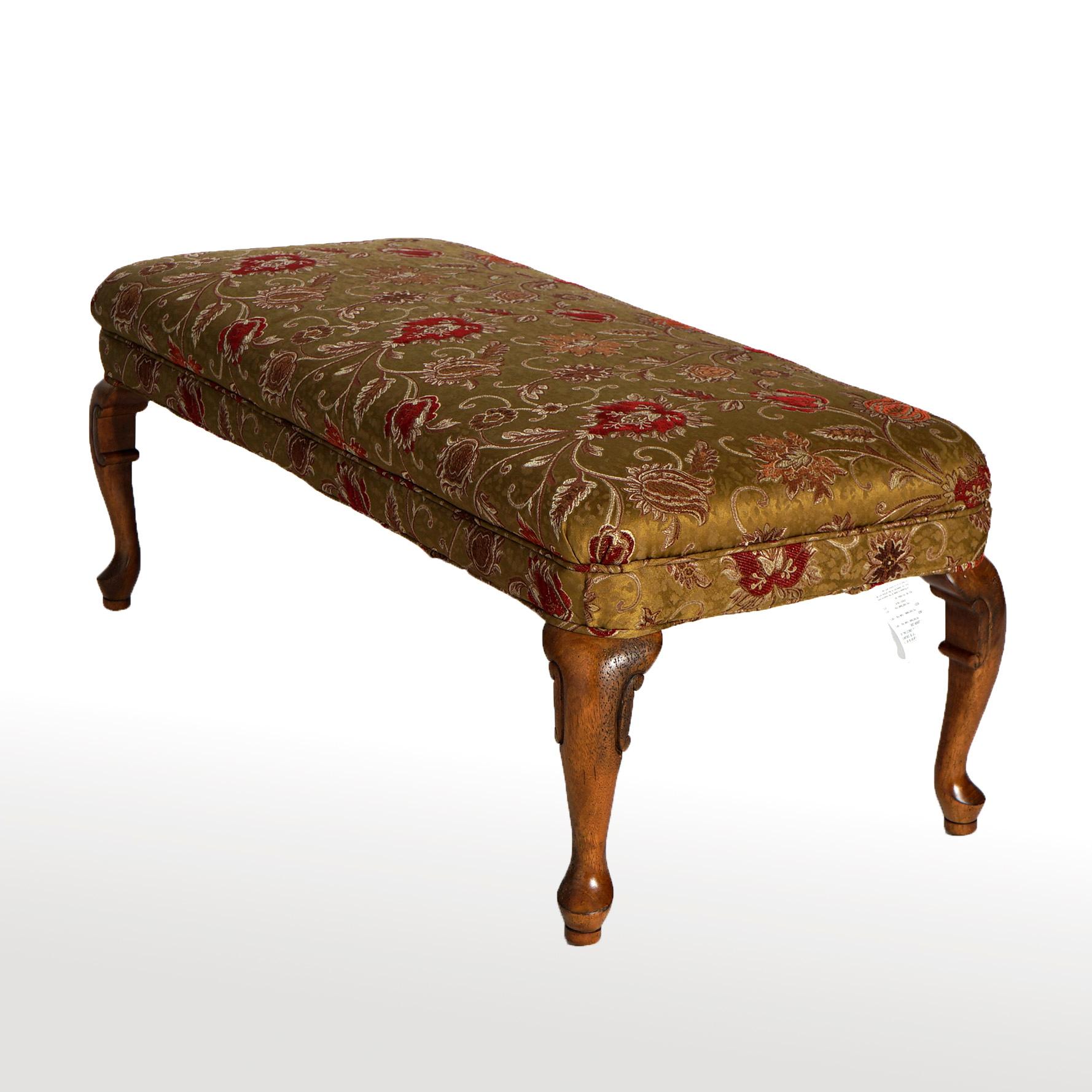 A Queen Anne style long bench offers upholstered seat raised on carved walnut cabriole legs terminating in pad feet, 20th century

Measures- 19''H x 46''W x 23.25''D.

Catalogue Note: Ask about DISCOUNTED DELIVERY RATES available to most regions