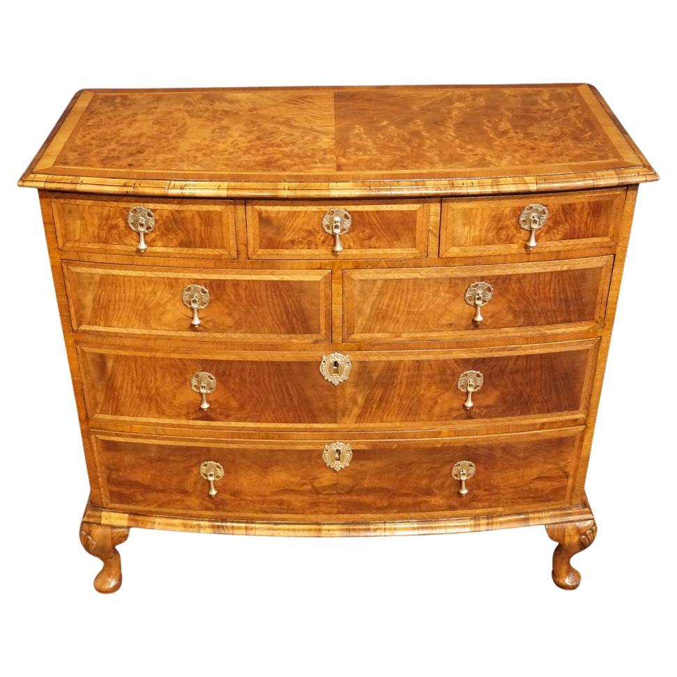 Queen Anne style walnut bow chest 