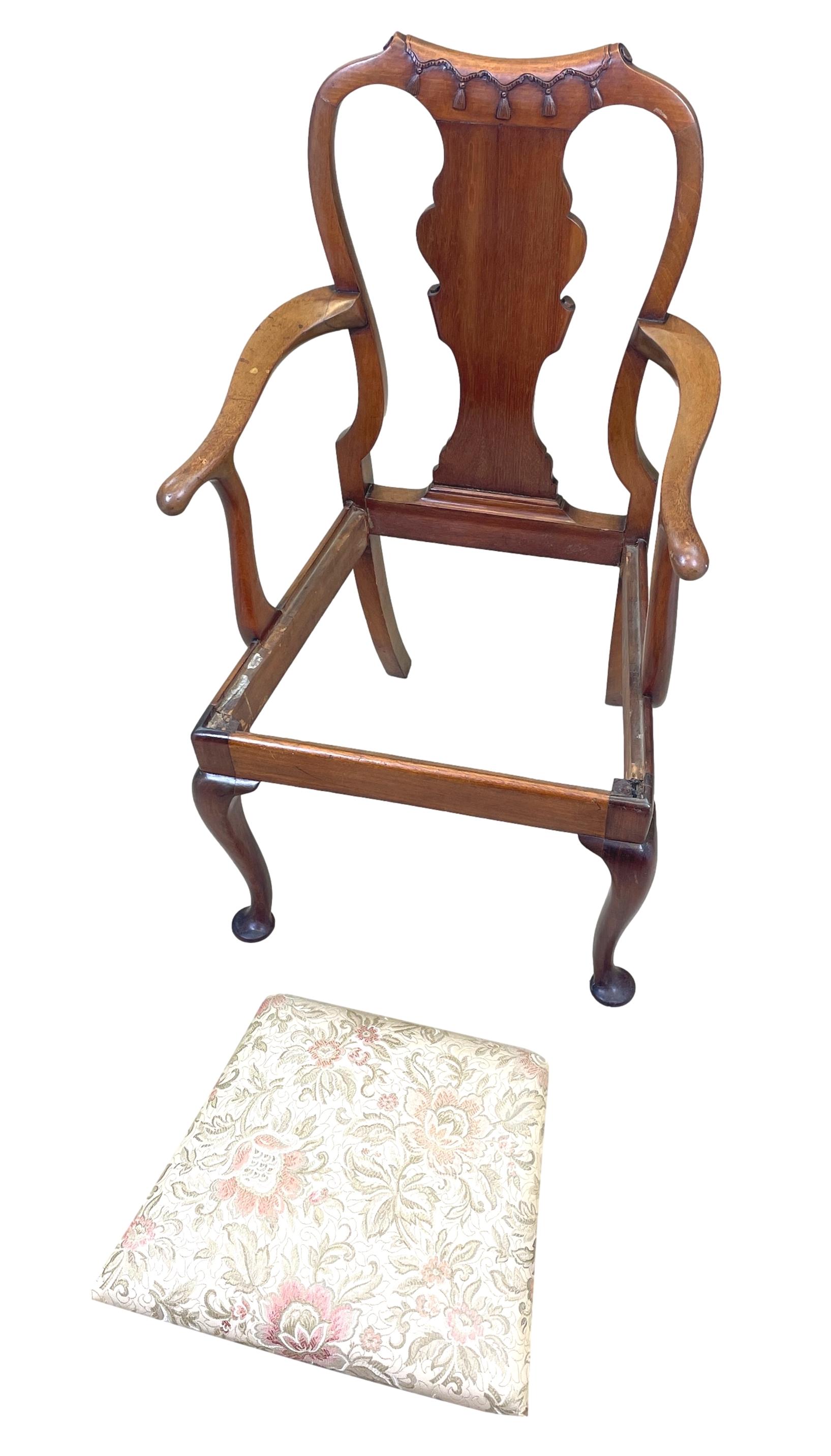 A very attractive and good quality and early 20th century Queen Anne style walnut childs chair having carved decoration to top of well figured splat back over drop in seat raised on elegant Cabriole legs. 

Childrens, or Childs Chairs as the name