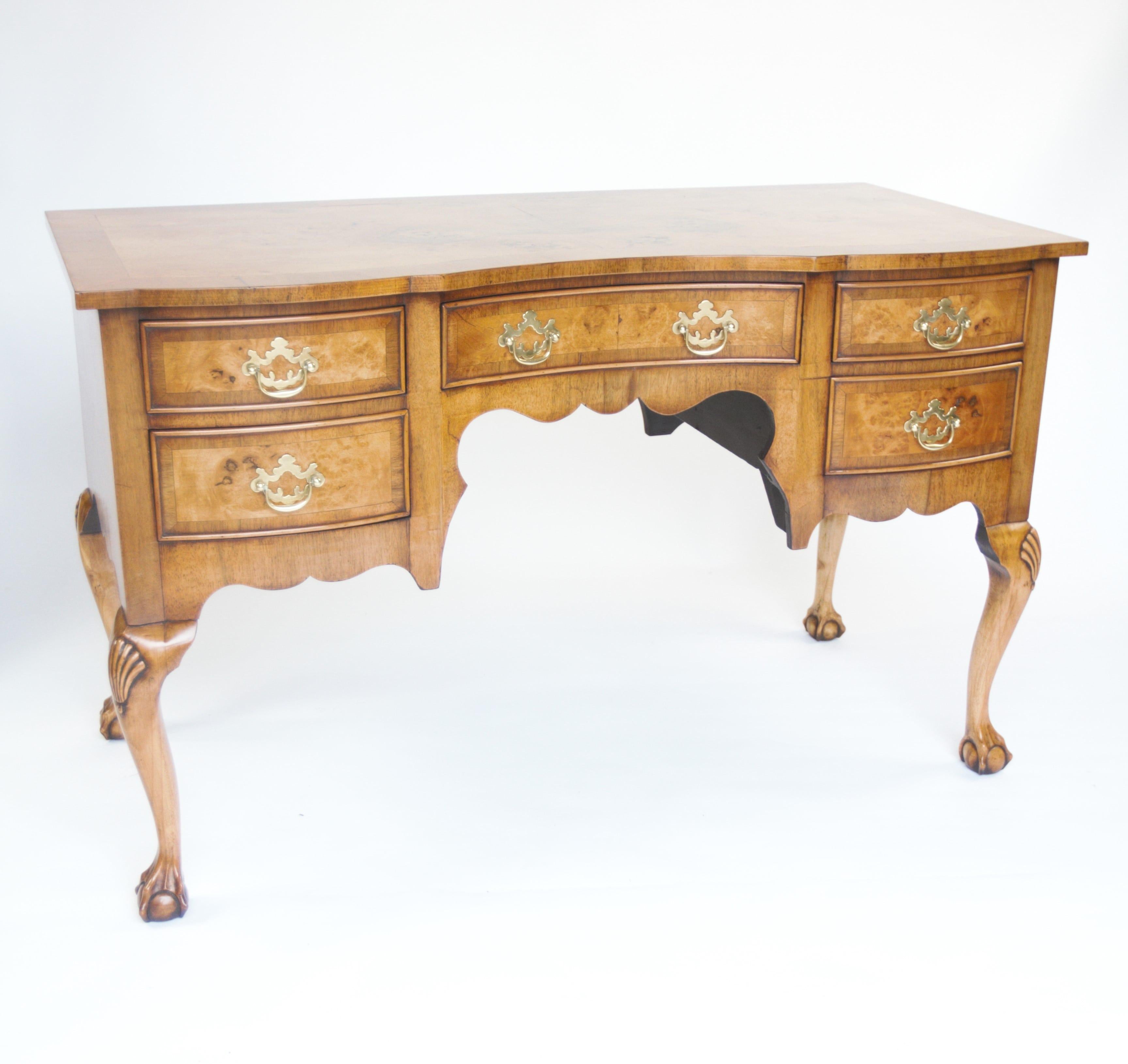 Queen Anne style Walnut Kneehole Dressing table with mirror & stool
circa 1930s
Figured Walnut top with cross-banding
Kneehole shaped 5 drawer base
sitting on 4 cabriole shaped legs with shell carving on knees
& carved claw & ball feet,
With:
Walnut