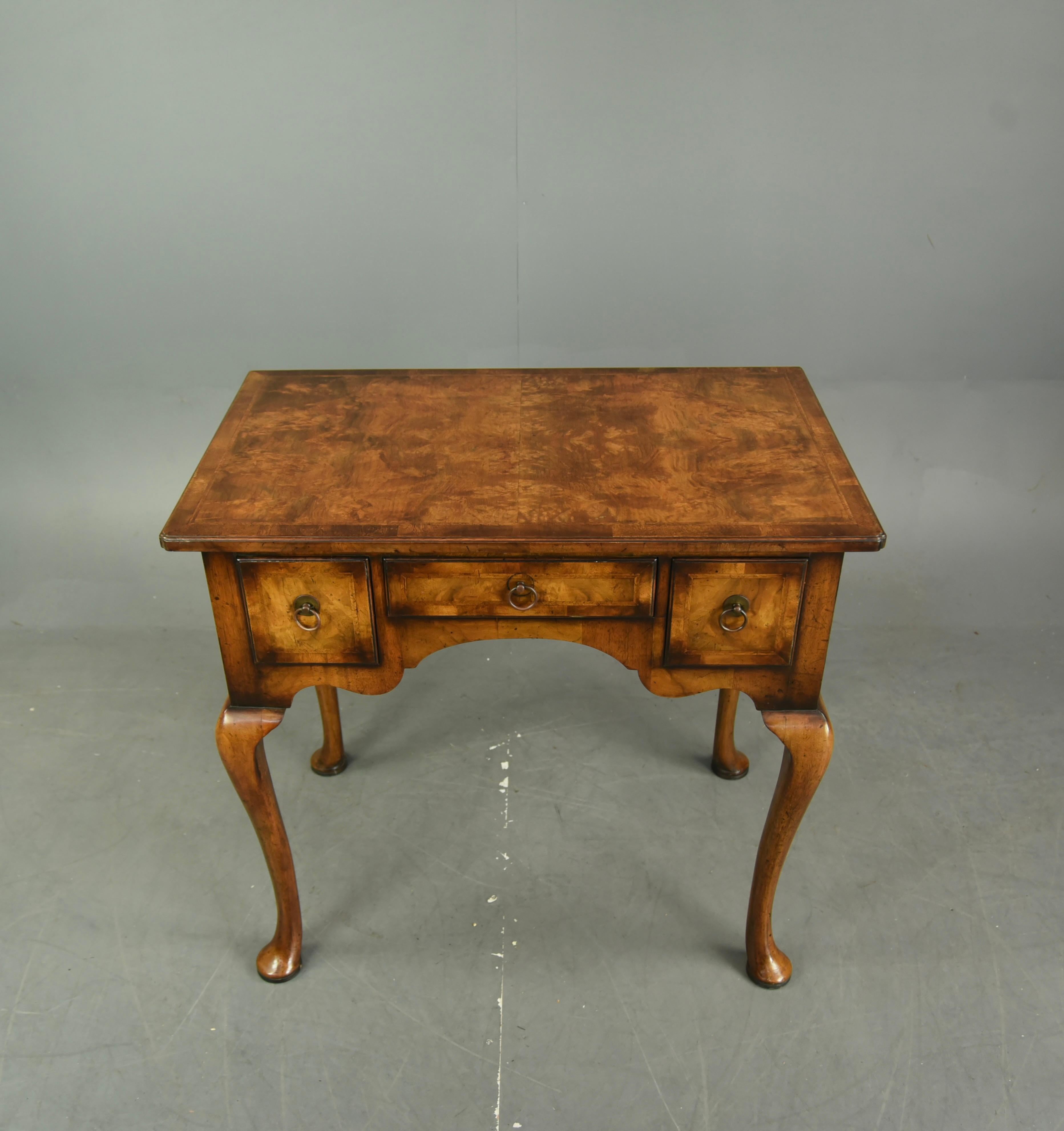 Good quality Georgian style walnut side table, circa 1900.
The side table has a great colour and grain with three very useful oak lined hand dovetailed drawers standing on wonderful Queen Anne style cabriole legs.
The side table is in very good