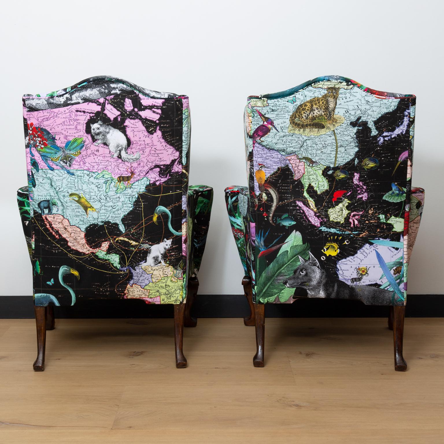 An impressive pair of English Queen Anne style wingback chairs, with contemporary upholstery in custom printed matte velvet fabric by Icelandic artist Kristjana S Williams.
This elaborate print, a combination of Williams' 'Neon Black Sea' artworks,