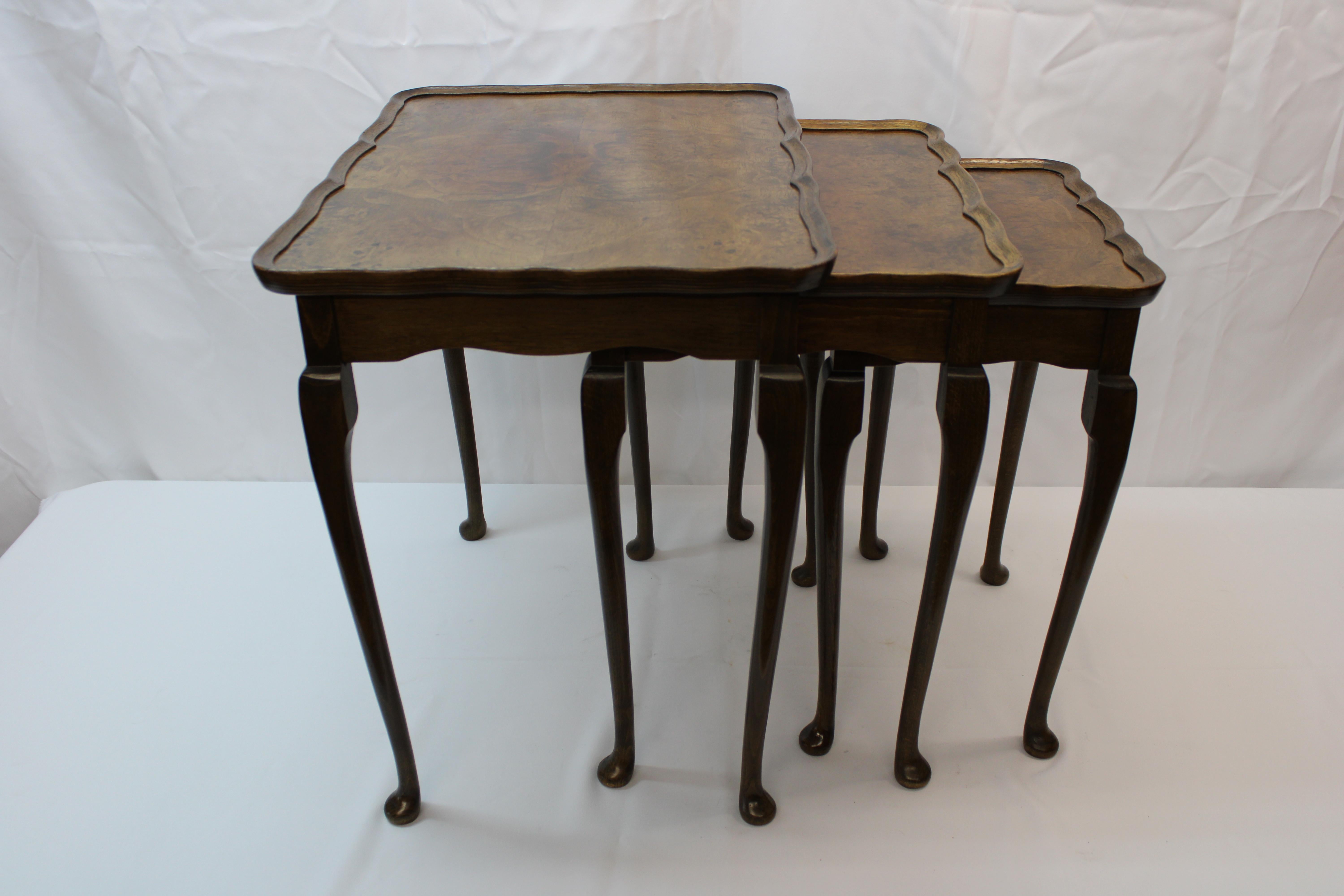Queen Anne styled burled wood nesting tables made in England.