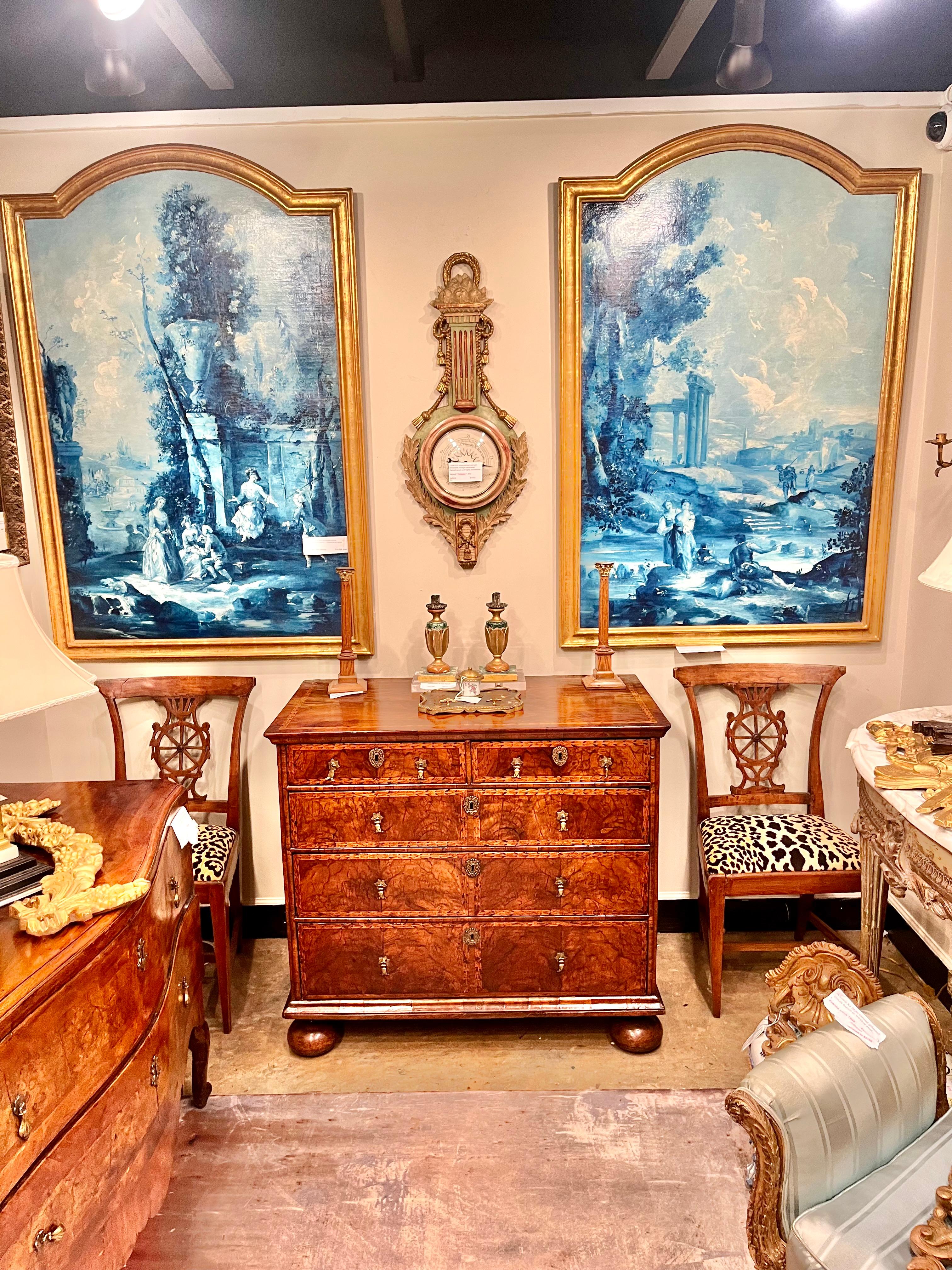 Striking and highly figured walnut chest with inlaid top and drawer fronts further accented by penwork . The top and drawers fronts with burl walnut veneers, contrasting colors from dark brown to reds and lighter browns . A good size for front room 