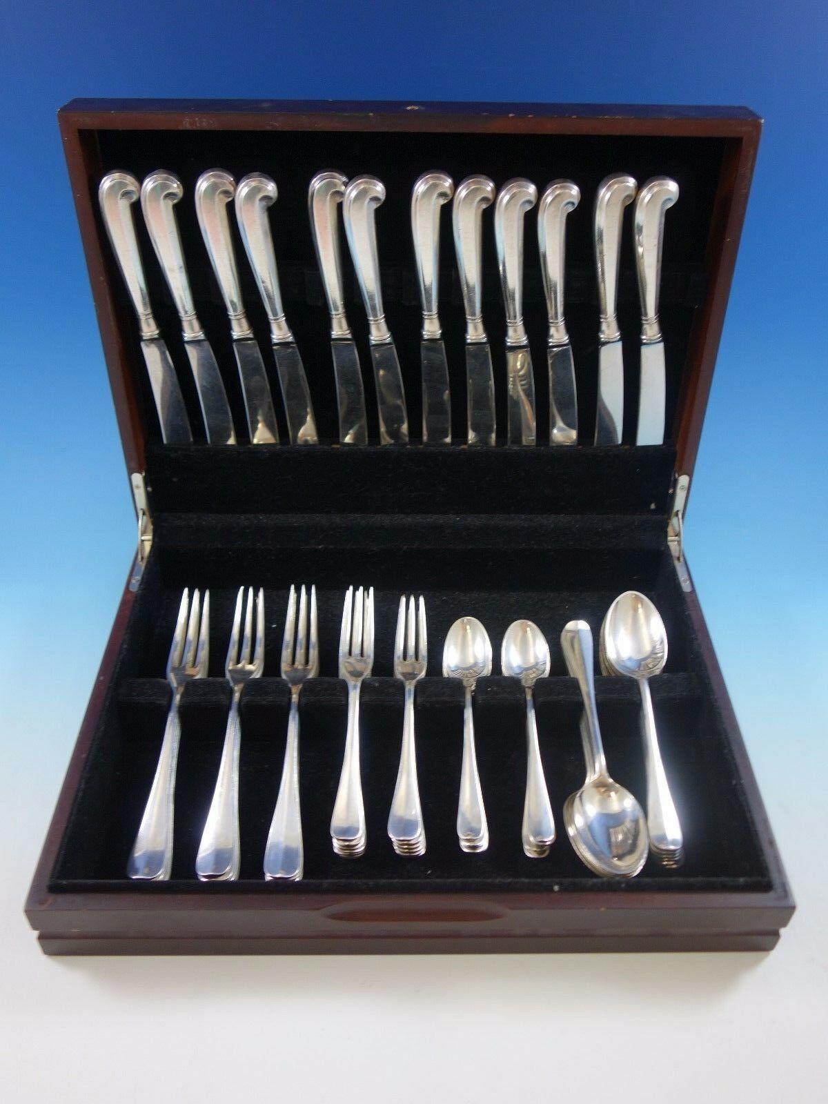 Queen Anne-Williamsburg by Stieff sterling silver flatware set, 60 pieces. This set includes:

12 dinner knives, pistol grip handle, 9 3/8