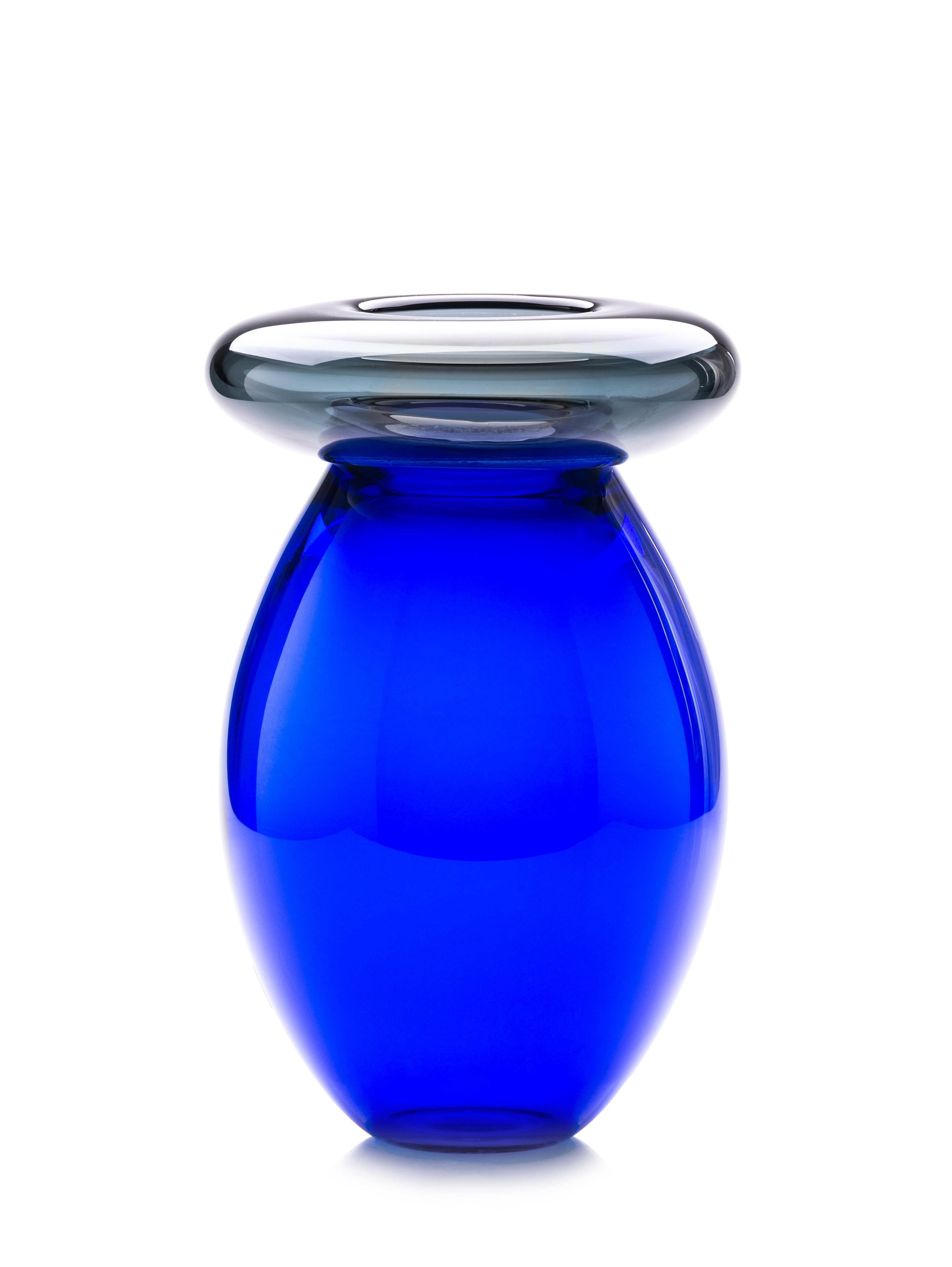 Queen Blue Vase by Purho
Dimensions: D20 x H30 cm
Materials: Glass
Other colours and Dimensions are available.

Purho is a new protagonist of made in Italy design , a work of synthesis, a research that has lasted for years, an Italian soul and