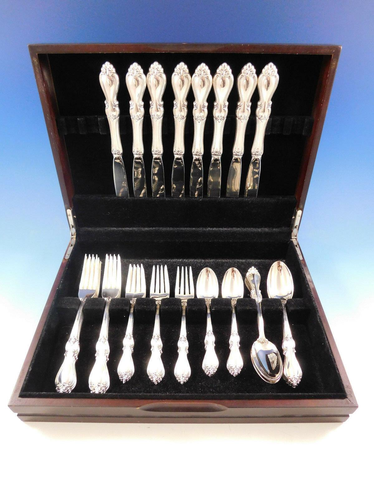 Dinner size Queen Elizabeth I by Towle sterling silver flatware set, 40 pieces. This set includes:

8 dinner size knives, 9 5/8