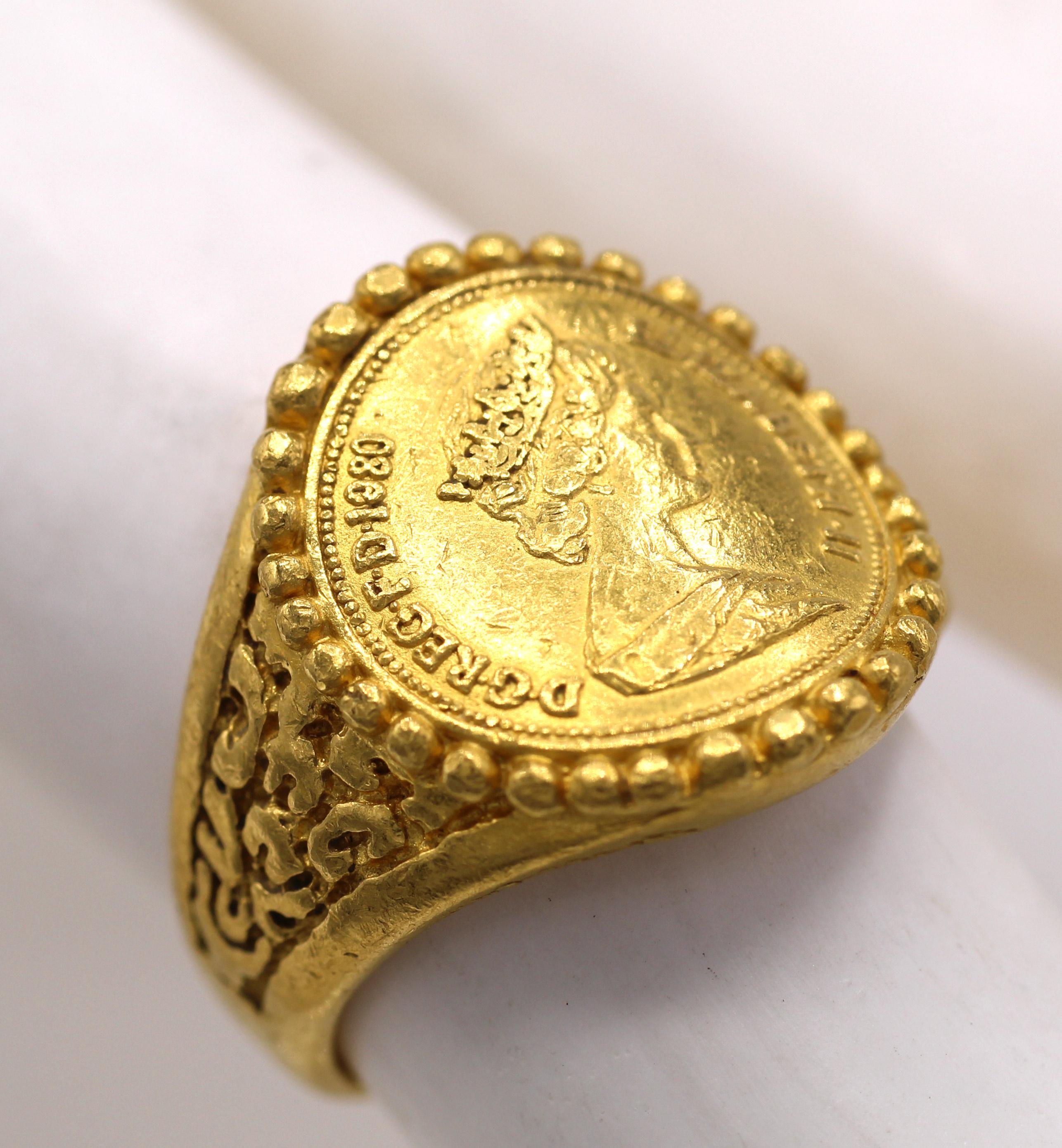 Beautifully handcrafted in 24 Karat yellow gold this ring features a cold coin dedicated to Queen Elizabeth II set in a boarder of gold beads with fine hand-engraving on either side of the shank. 