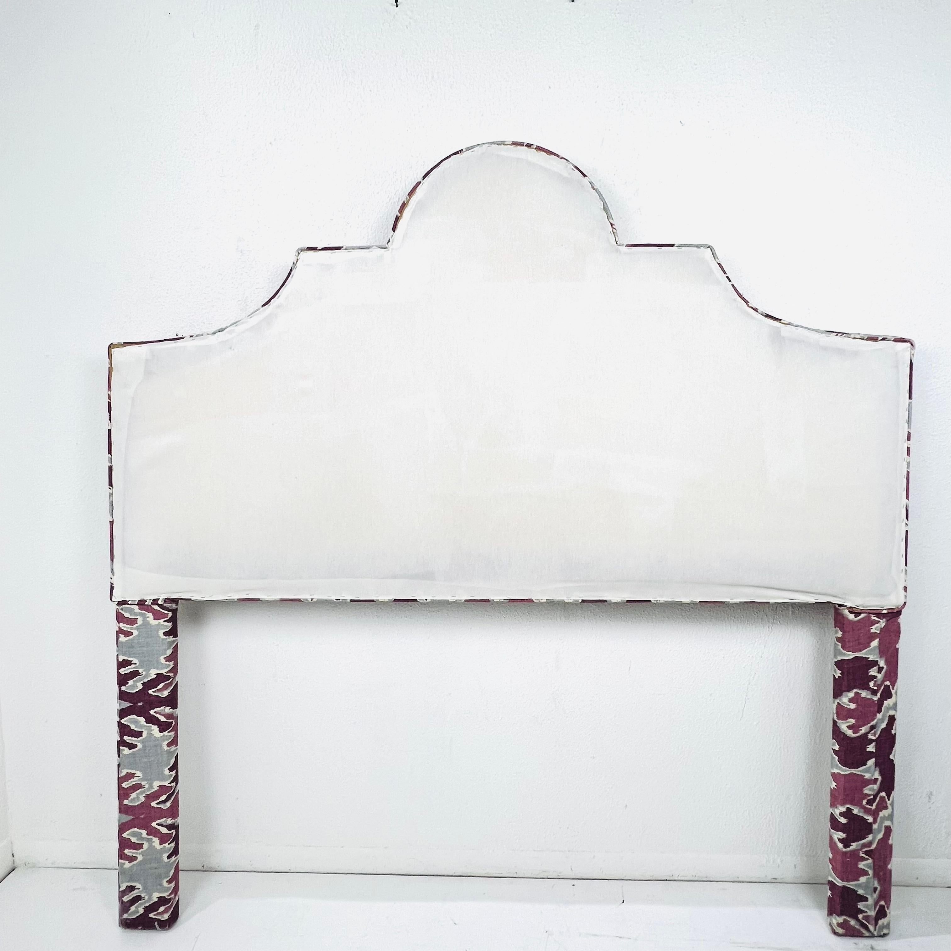 Queen size headboard upohlstered in Lee Jofa Magenta Bengal Bazaar Fabric by Kelly Wearstler.  Portman shaped curved frame. Both frame and upholstery in good condition.