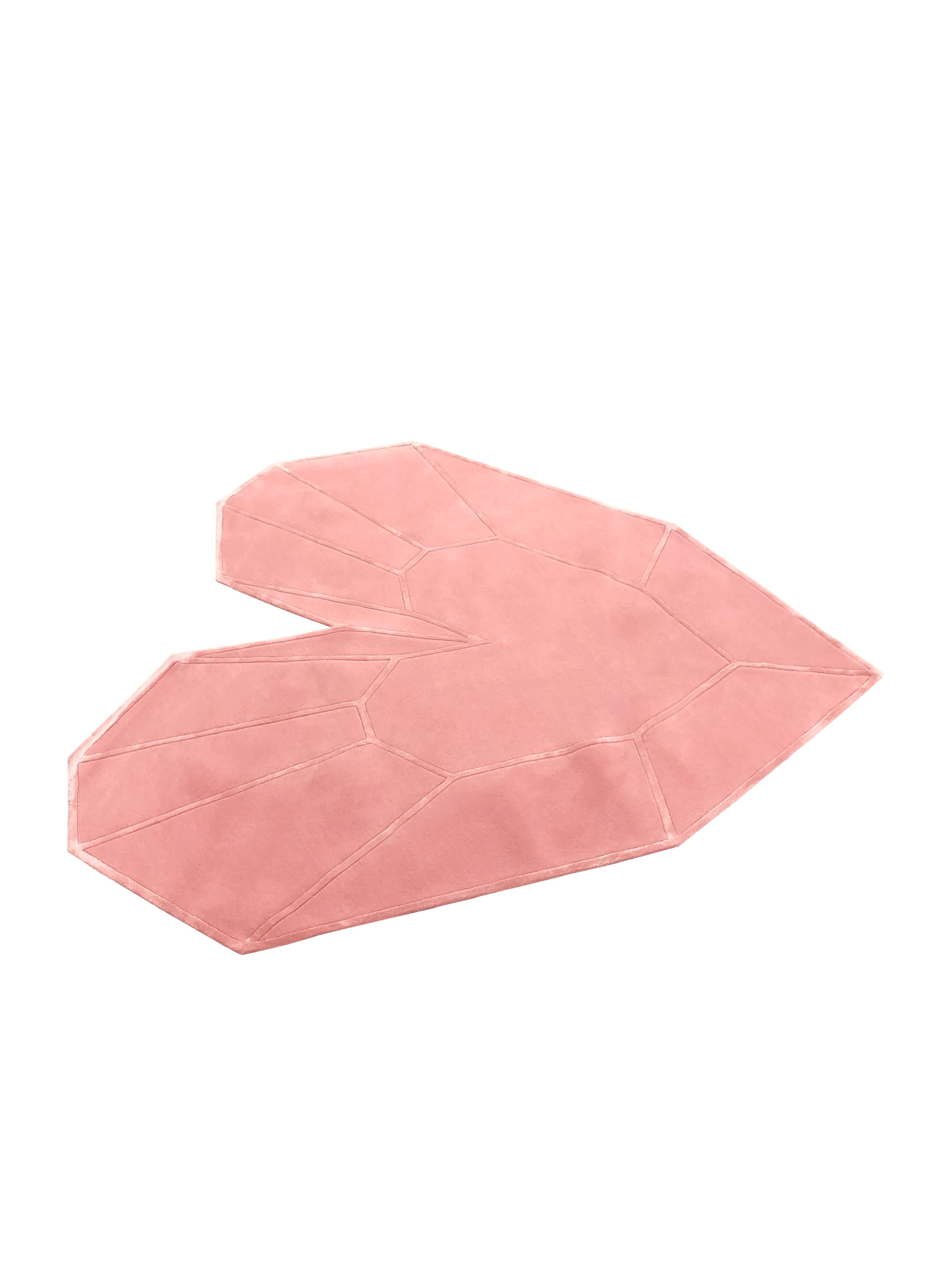 Queen Heart rug by Royal Stranger
Dimensions: 280 x 240 x 2 cm
Materials: Blossom pink wool structure rug drawn and contoured with silk

This royal and romantic rug makes you wander to another dimension. A romantic and luxurious heart rug mixing
