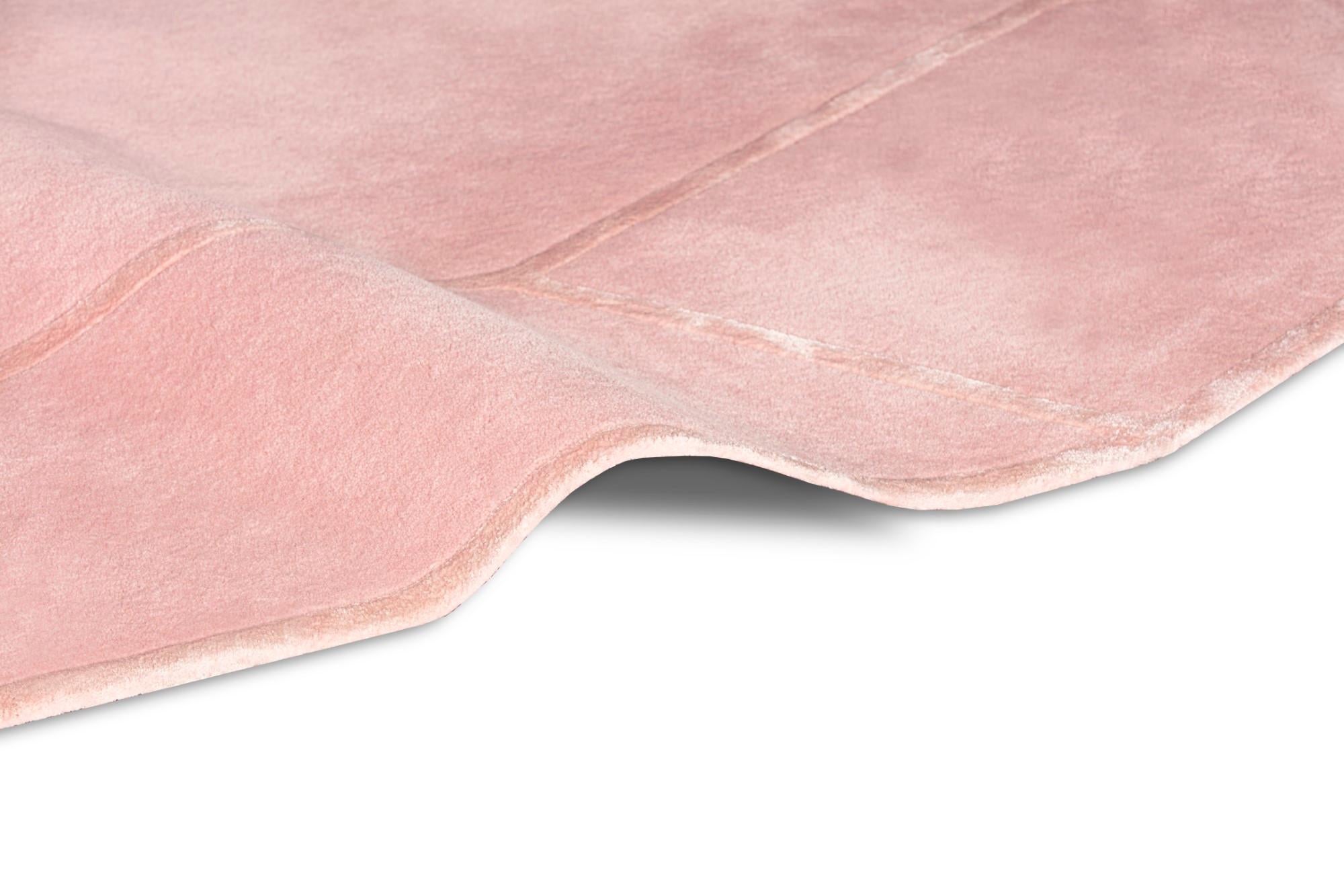 The sweet and romantic shape of the Queen Heart Rug is inspired by the wonderland world.
It turns any space into a joyful, magical and enchanted place.

AS PICTURED
Main area: New Zealand wool
Lining: Botanical Silk