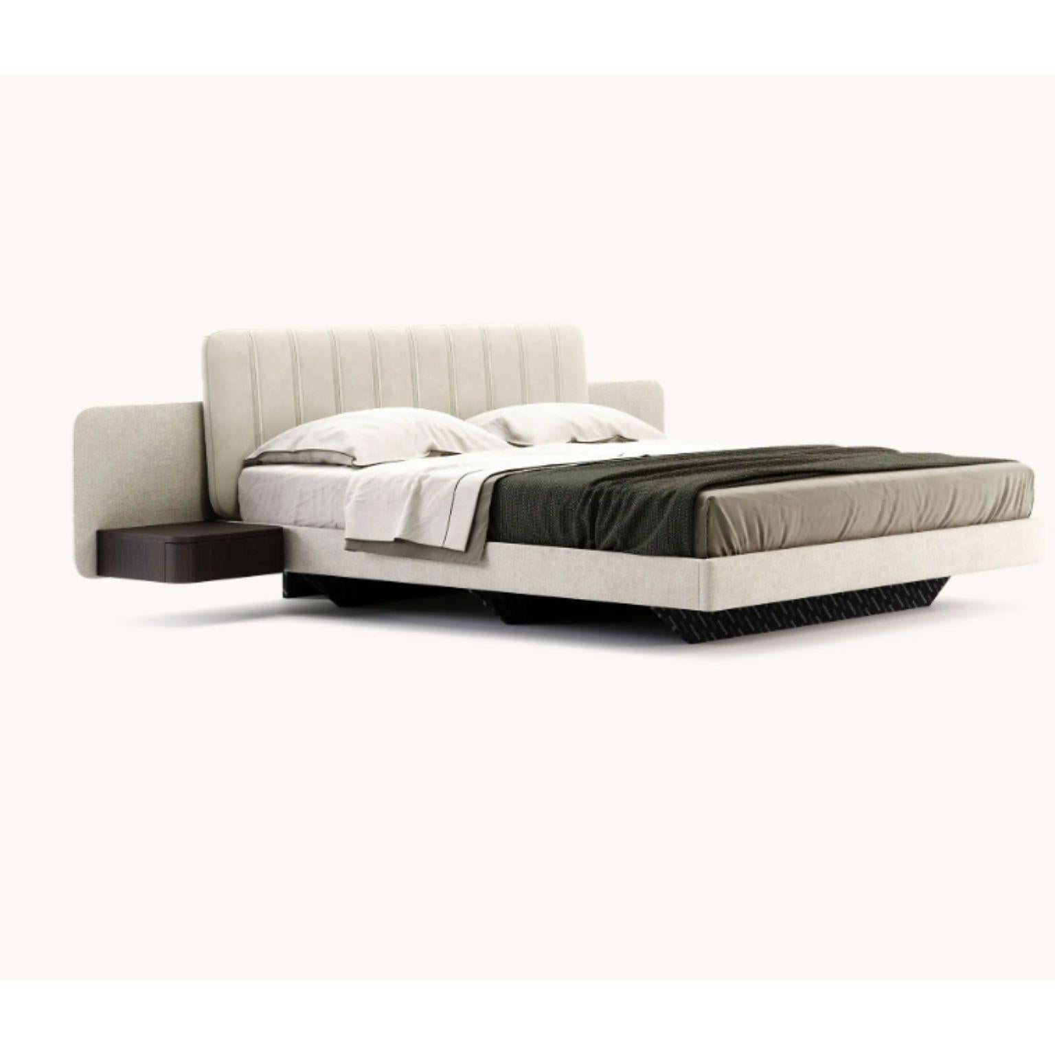 Queen size Amanda bed by Domkapa
Materials: Fumé oak, microfibers (Tarn 01), fiber (Helmand 05). 
Dimensions: W 281 x D 223 x H 93 cm.
Also available in different materials.

An outstanding design inspired by the contemporary traces we all