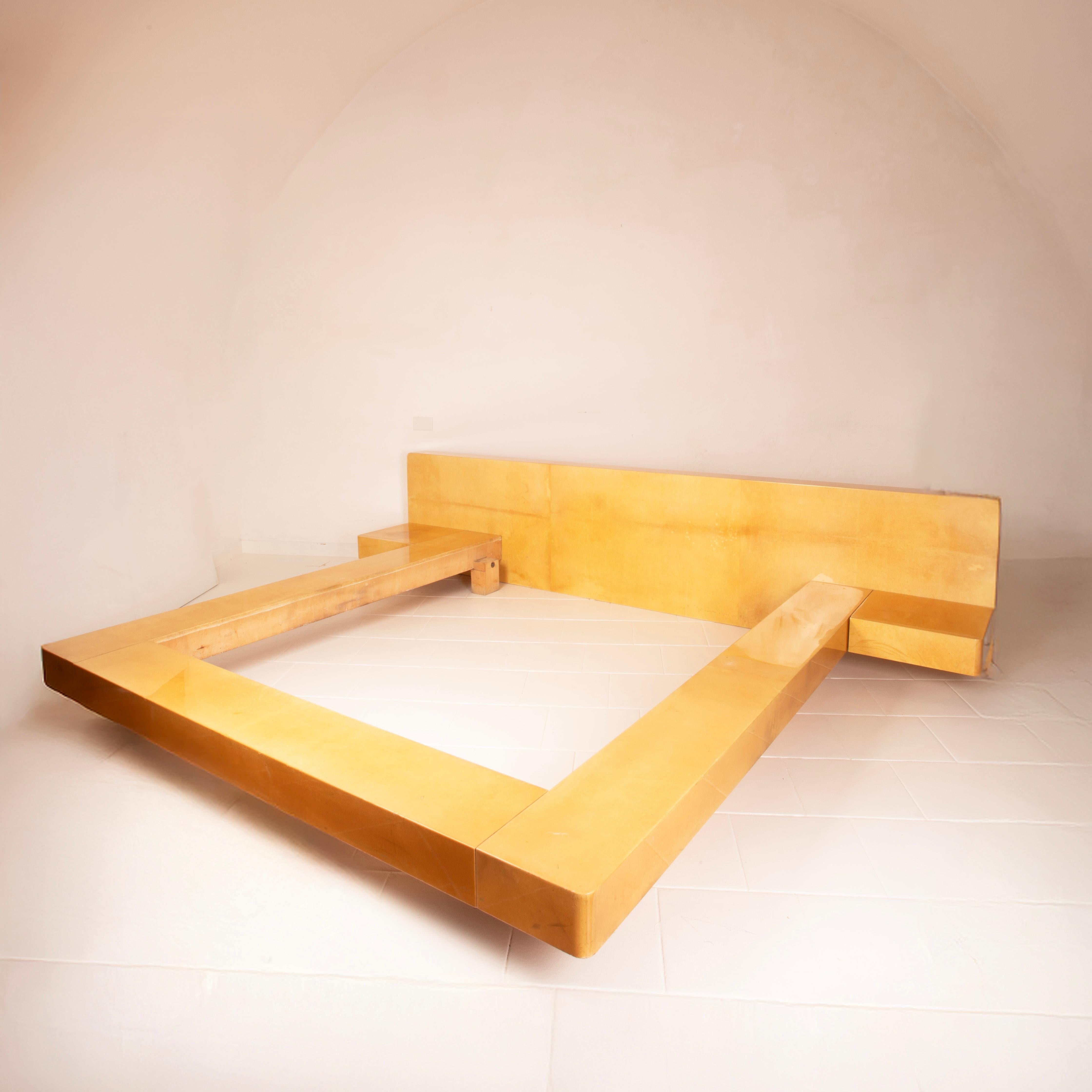 A majestic and unrepeatable creation by Aldo Tura, this 1960s double bed represents one of the highest expressions of the radical and sophisticated aesthetic of the great Milanese designer. Entirely clad in precious hand-dyed parchment in warm