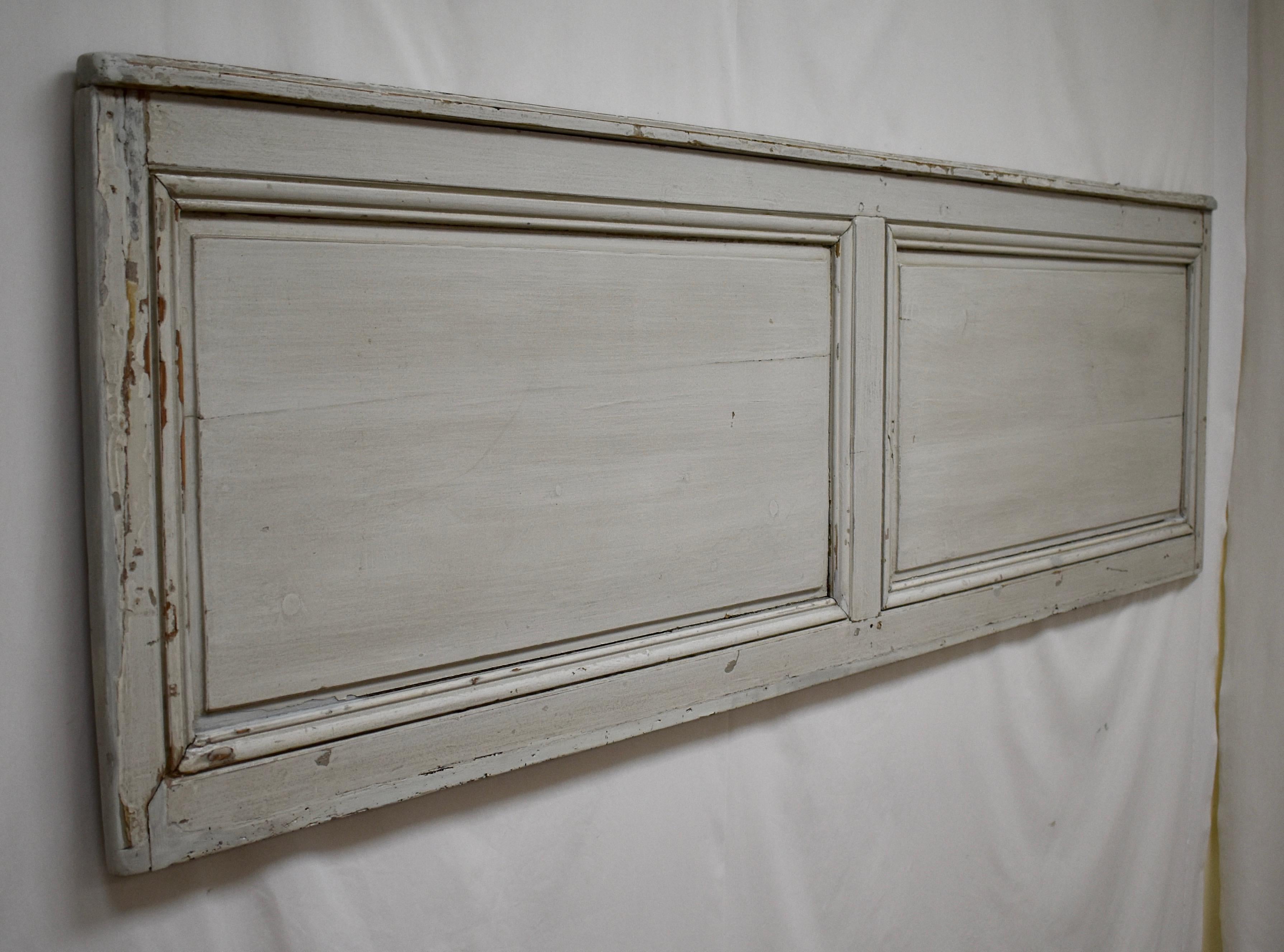 This painted pine wall panel, reclaimed from a 19th century French room, would make a great headboard for a Queen size bed. The two raised panels are pretty much symmetrical. One side is in original pale blue paint, the reverse is gloriously
