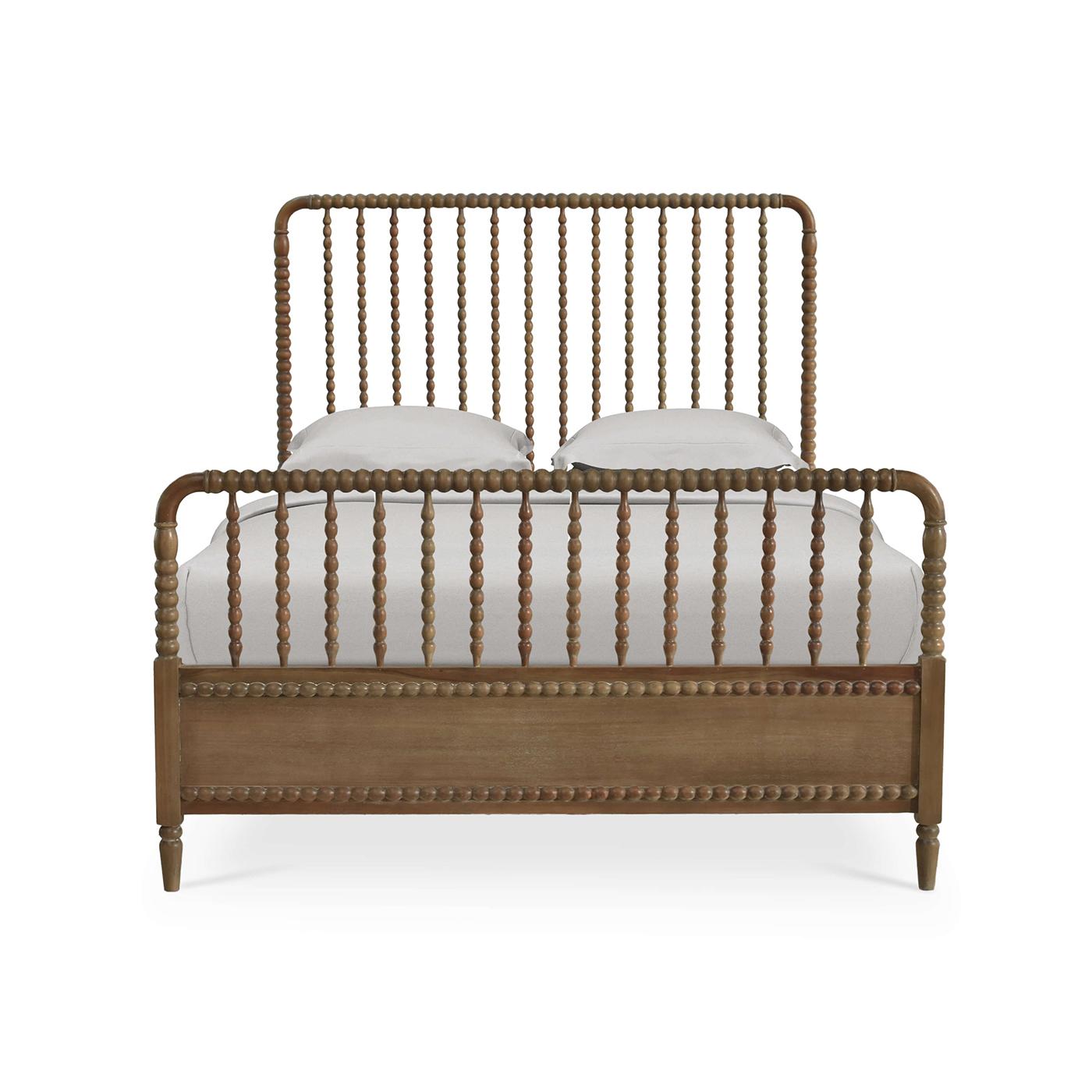 Constructed with mahogany and in our Straw Wash finish. This beautifully crafted bedframe combines classic design elements with sturdy construction, creating a timeless centerpiece for your bedroom.

Features intricately turned spindles on the