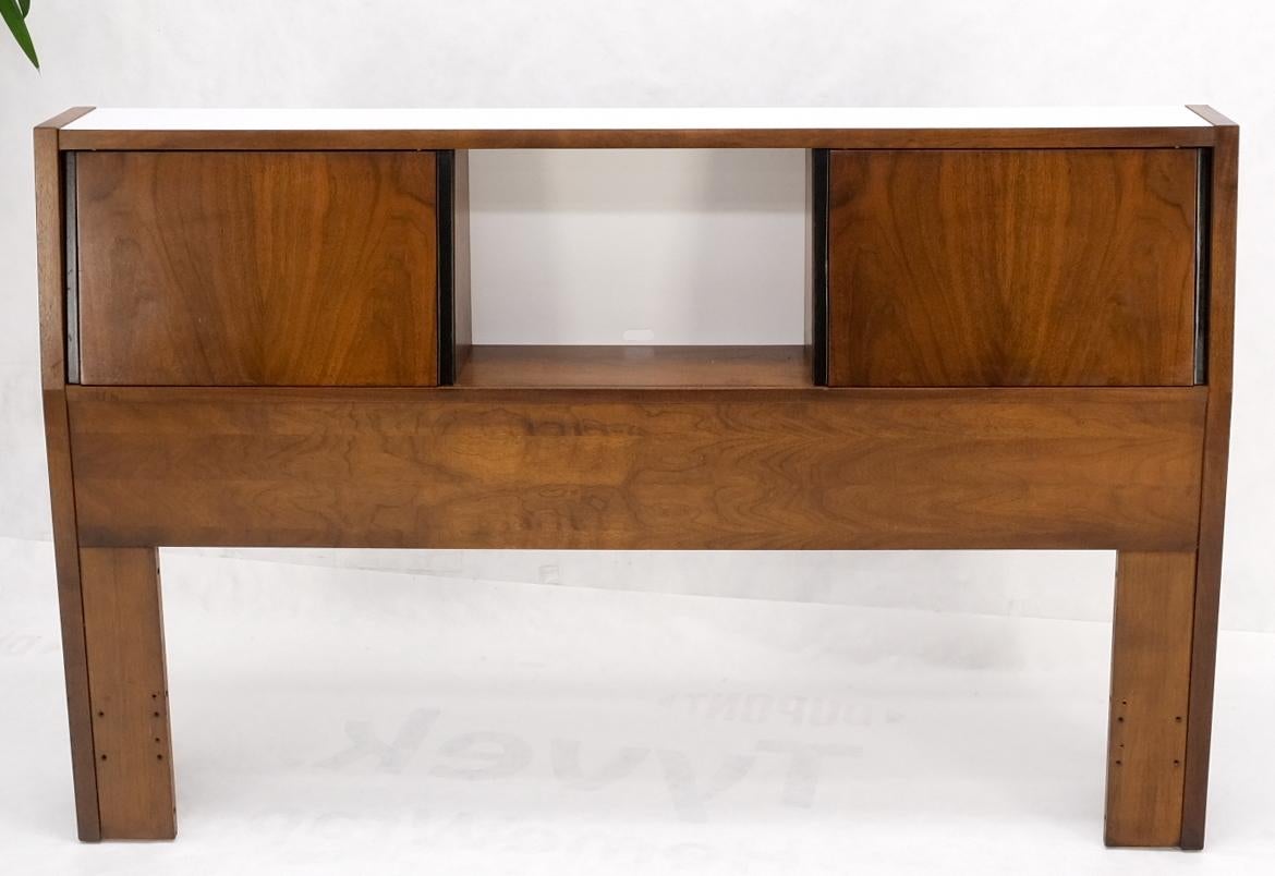 Mid-Century Modern walnut queen size headboard bed w/ two sliding doors compartment.