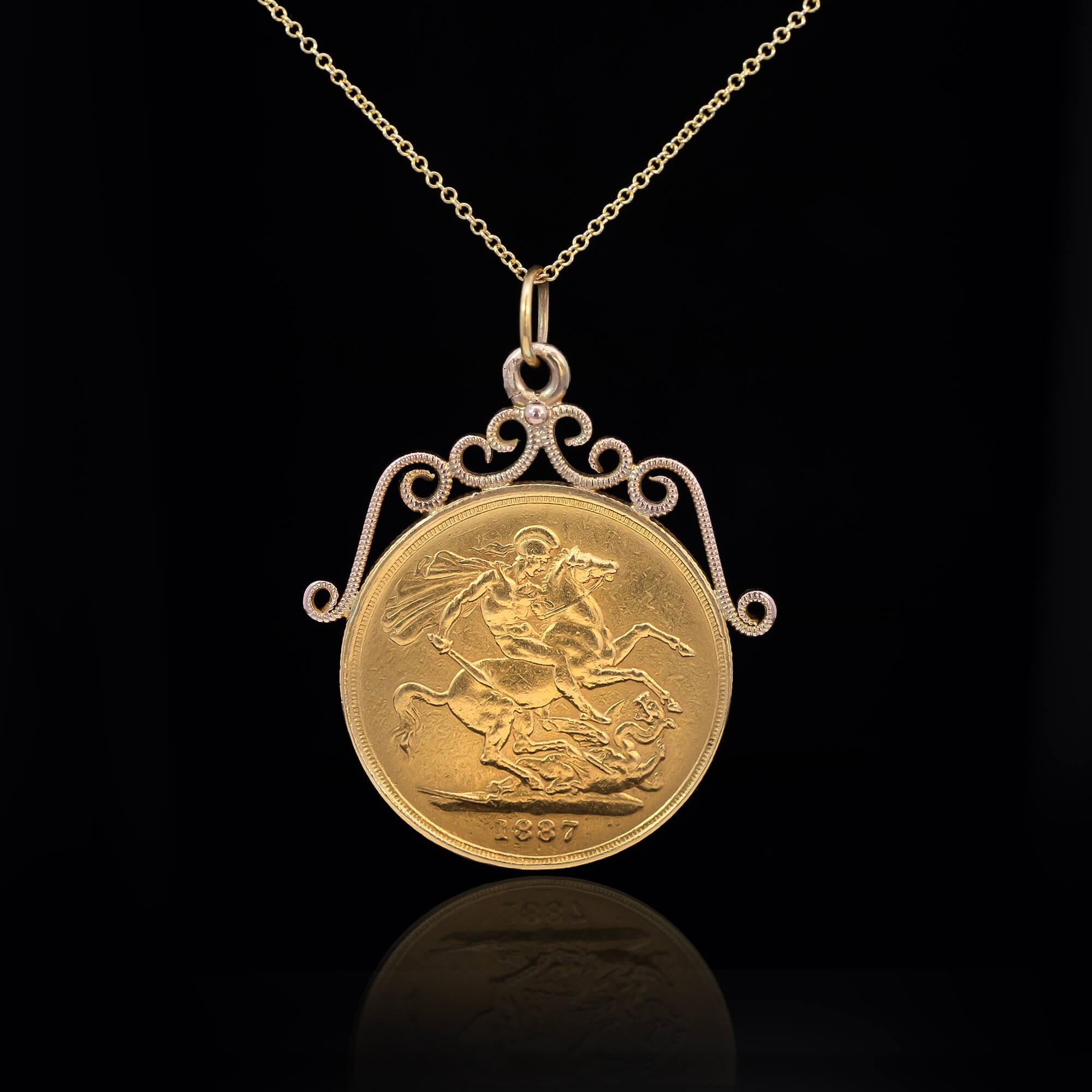 Queen Victoria golden jubilee coin pendant. Featuring a 1877 two pound coin with attached hand-made scrolled wire work pendant frame crafted in 9k yellow gold, this is to celebrate 50 years of Queen Victoria's reign.

Metal: Coin 22k yellow gold,