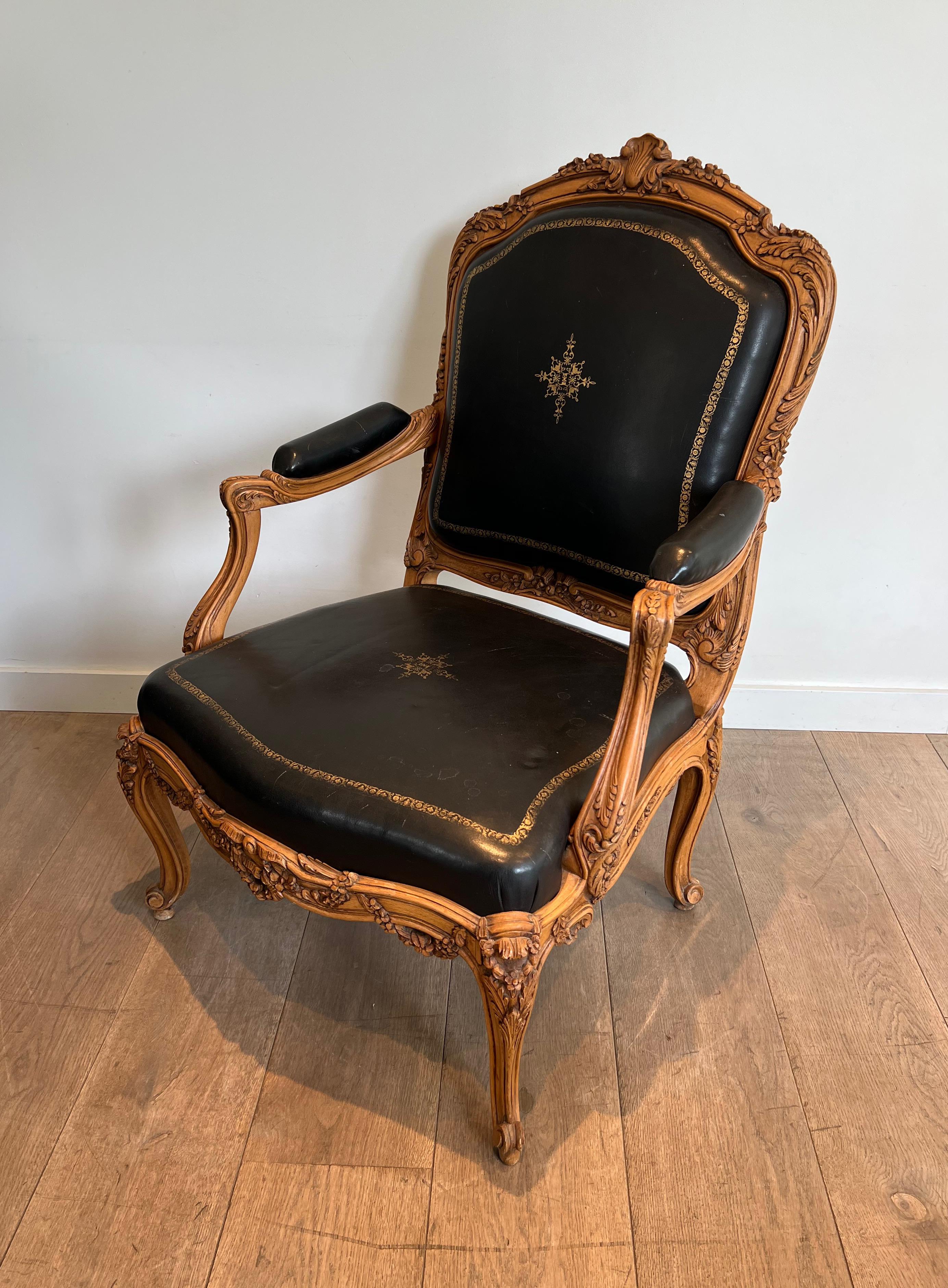 French Queen's Armchair made of Carved Walnut Upholstered in Black Leather with Iron-Gi For Sale