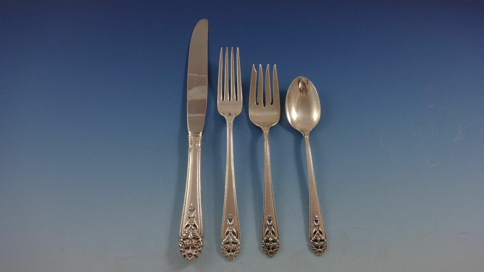 Queen's Lace by International sterling silver flatware set - 55 pieces. This set includes:

12 knives, 9 1/8