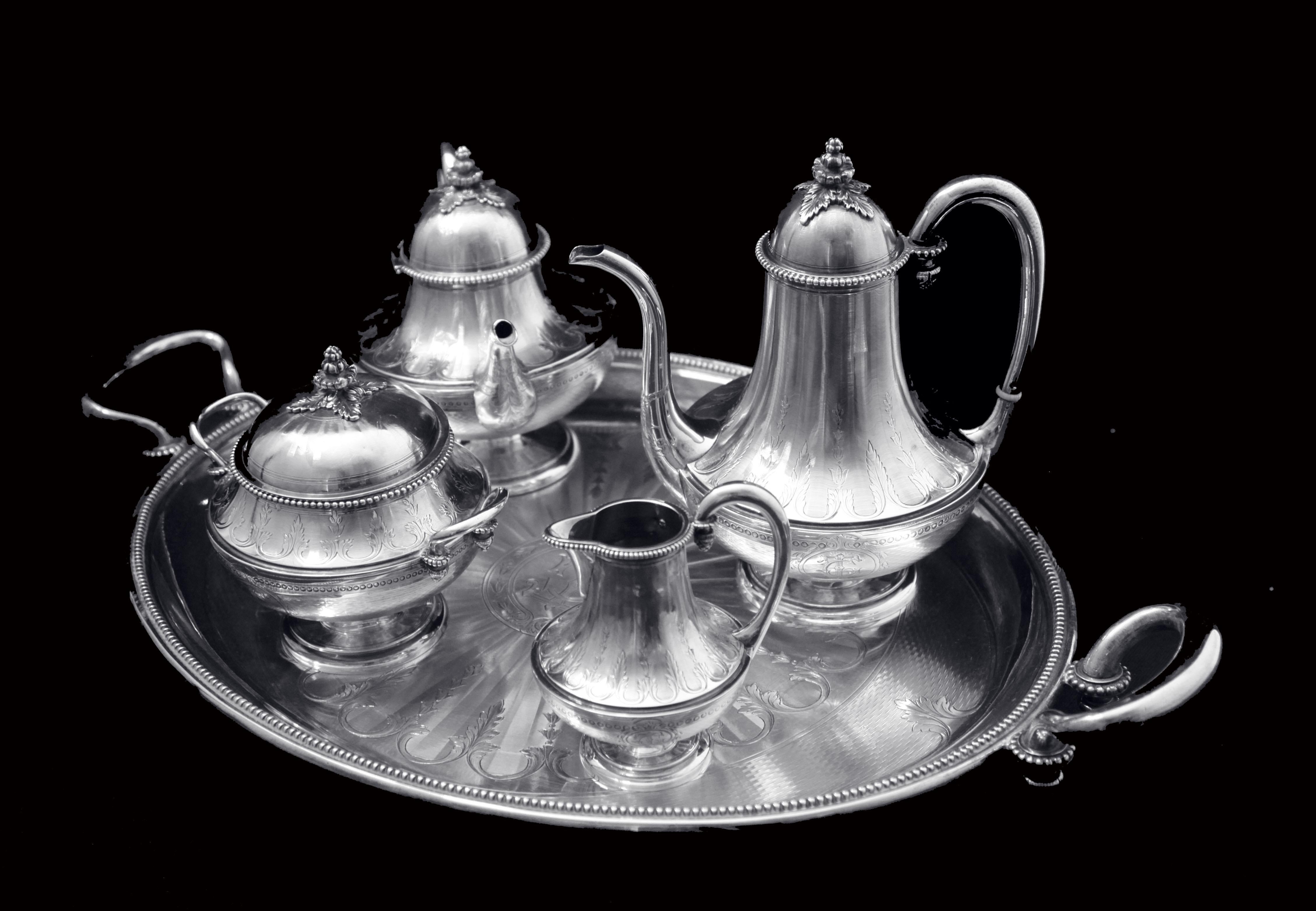 Direct from Paris, a magnificent 5pc. antique French 950 sterling silver tea set, Louis XVI model, by internationally known French silversmith Pierre Queille, with accompanying 5 anti-tarnish storage wraps for easy storage.  Pierre Queille is a name