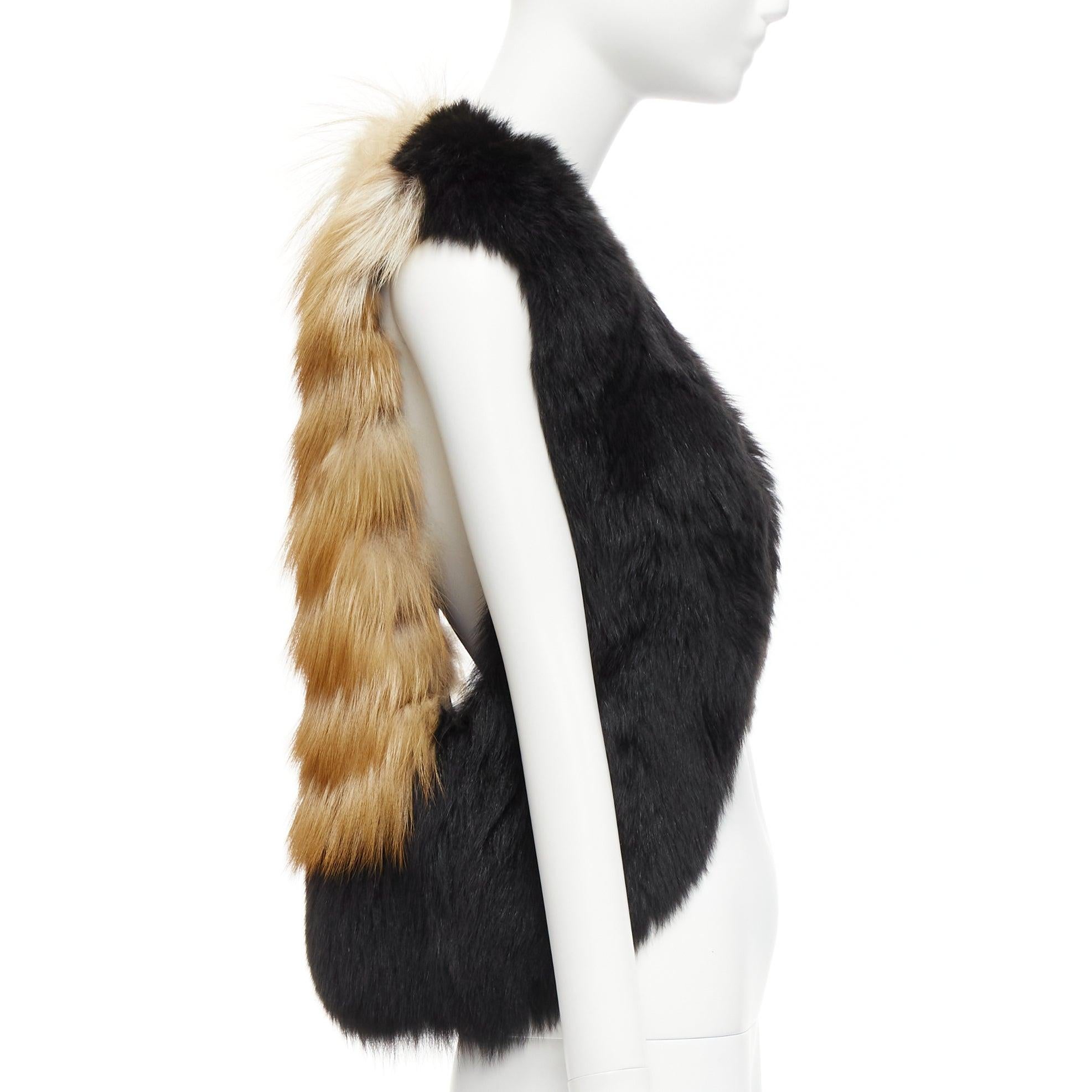 QUENTIN VERON black brown bicolor lamb fur bolero vest jacket FR36 S
Reference: NILI/A00010
Brand: Quentin Veron
Material: Fur
Color: Black, Brown
Pattern: Solid
Lining: Black Fabric
Made in: France

CONDITION:
Condition: Excellent, this item was