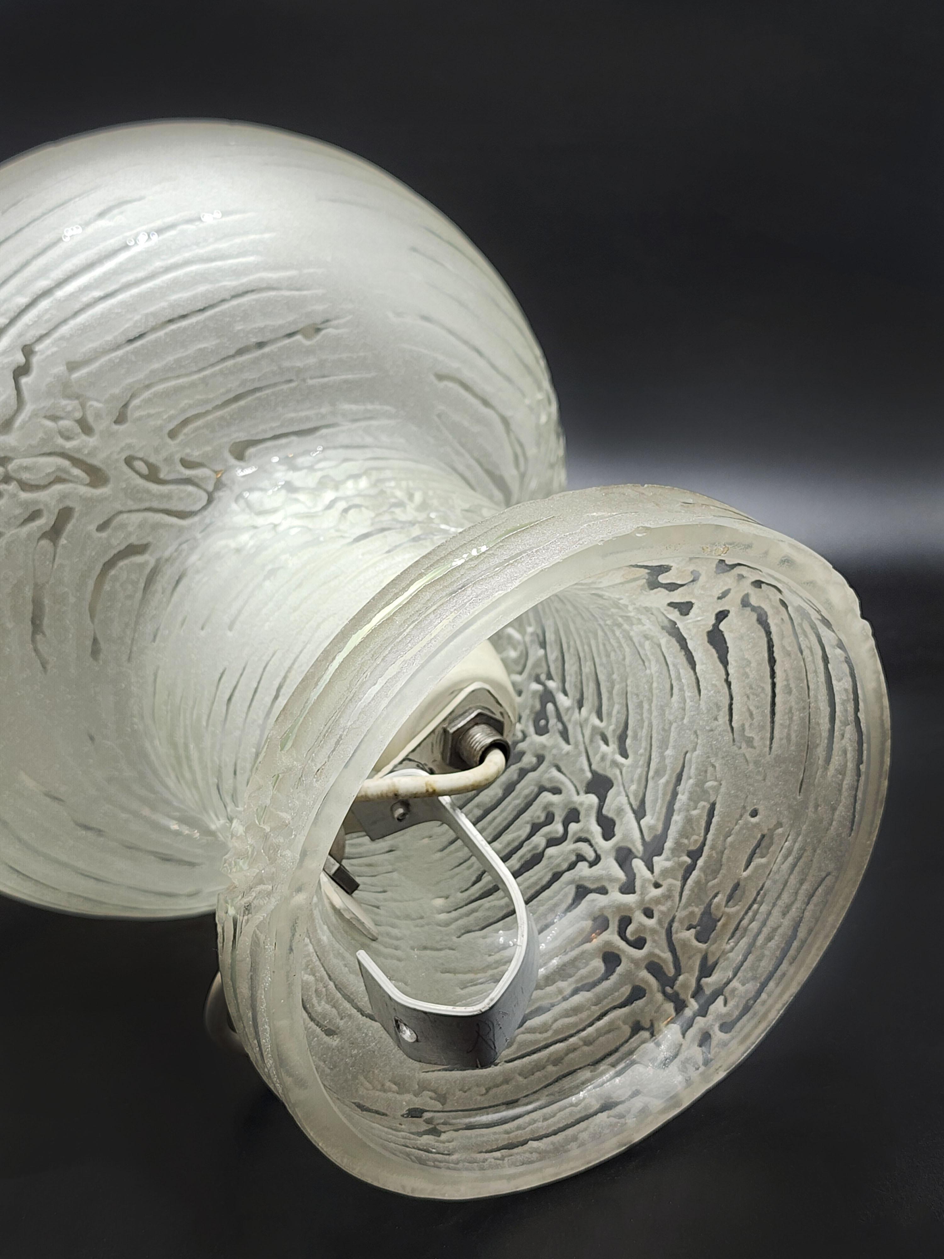 Querandi Art Glass Lamp, 1950s
Beautiful lamp with a unique design that mimics the texture and shape of a tree or coral. The base of the lamp widens downwards, and tapers upwards at the stem before expanding again into a rounded shape reminiscent of