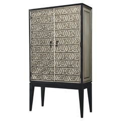 Queretano Armoire, a Statement Piece with Intricate Wood Decoration and Iron