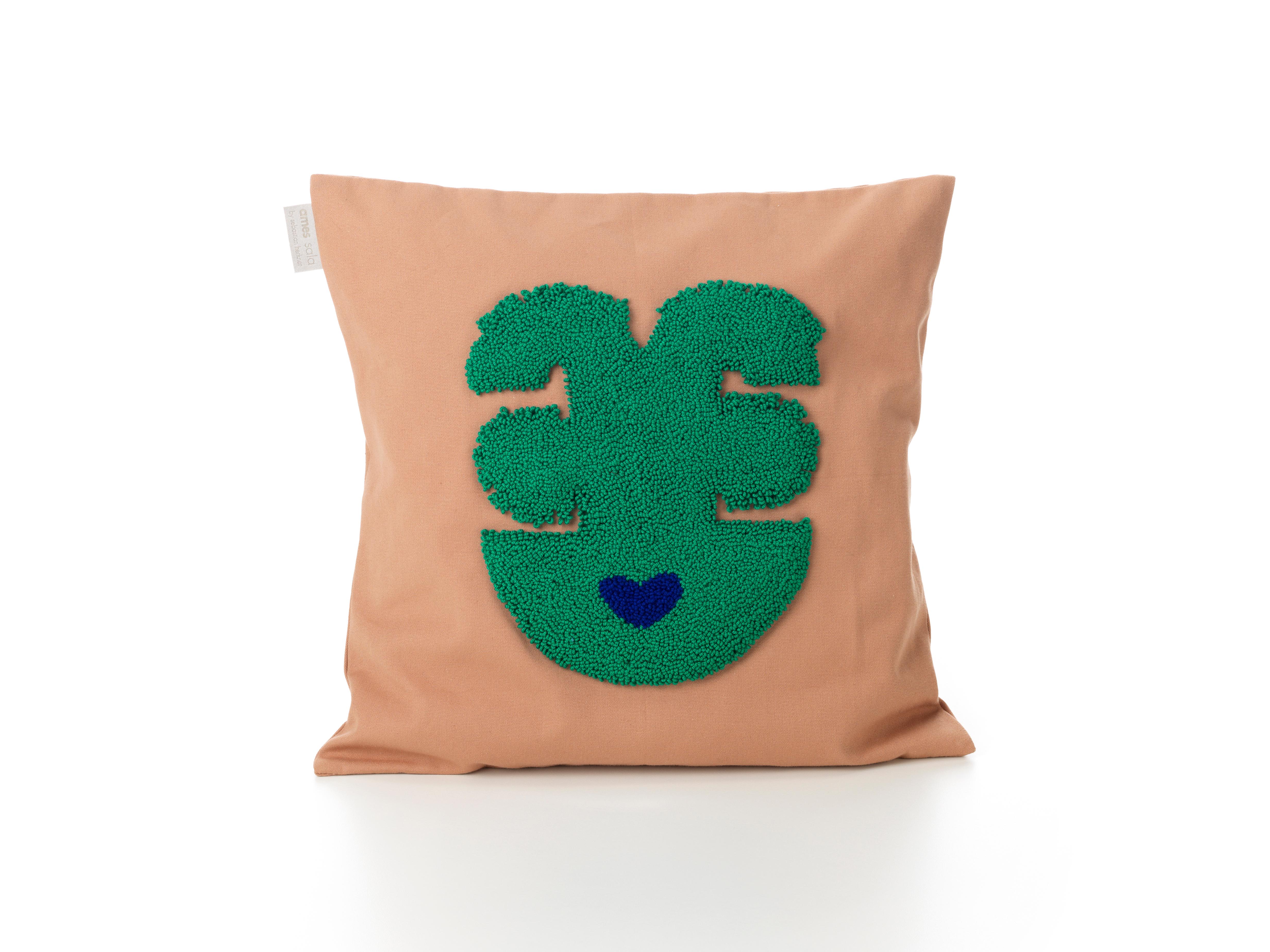 Quetzal Nido cushion by Sebastian Herkner
Materials: 100% cotton. 
Technique: Hand-woven in Colombia. 
Dimensions: W 38 x H 38 cm 
Available in colors: Nature, night blue, beige pink, terracotta. 

The Nido Qeztal cushion combines joyful colors with