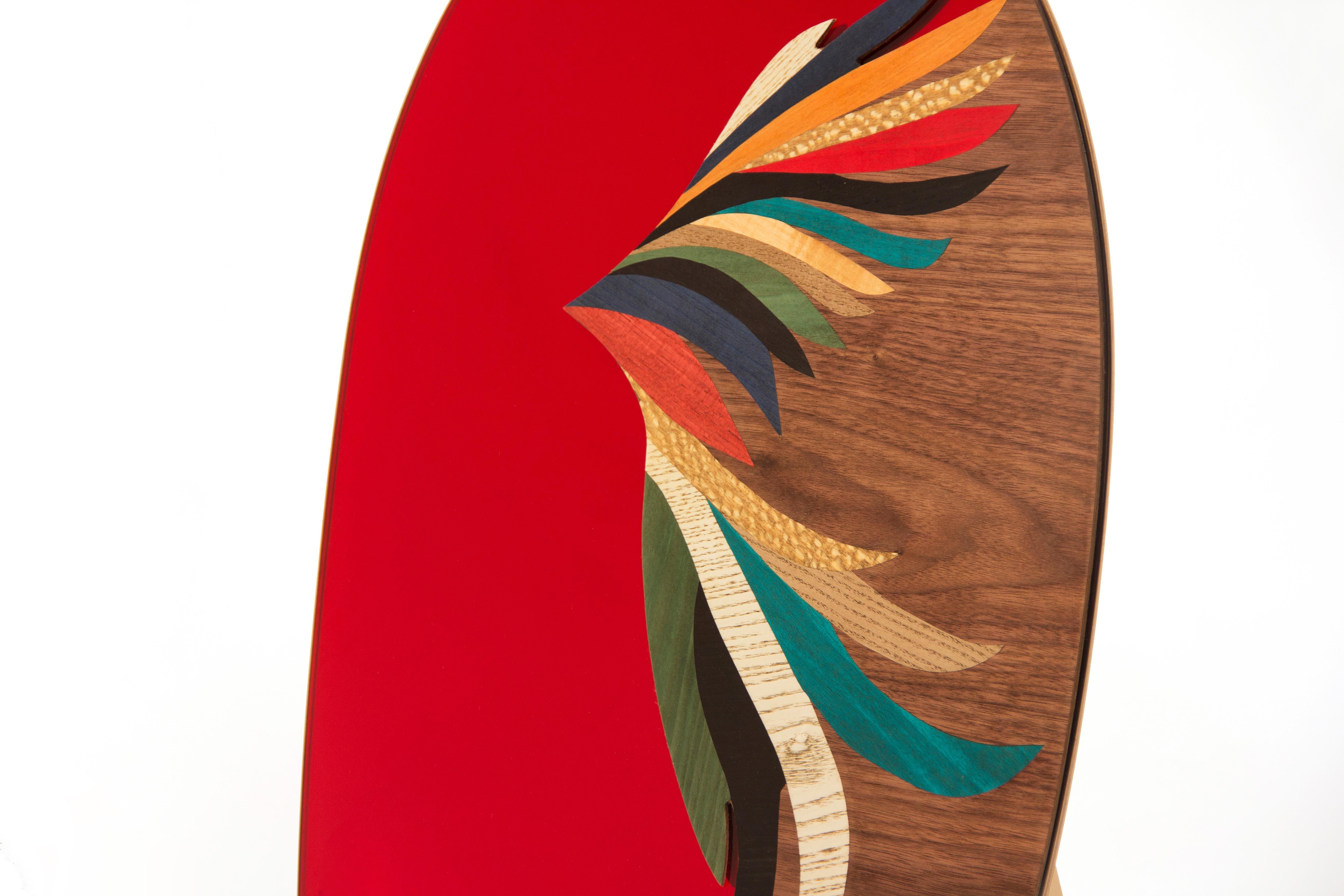 A collection of mirrors inspired by the silhouette of the Quetzal, a bird of great relevance for the Mexican and Central American culture. Bold colors are a distinctive feature of Quetzal mirrors. 
Mirrors that combines colored glass paired with