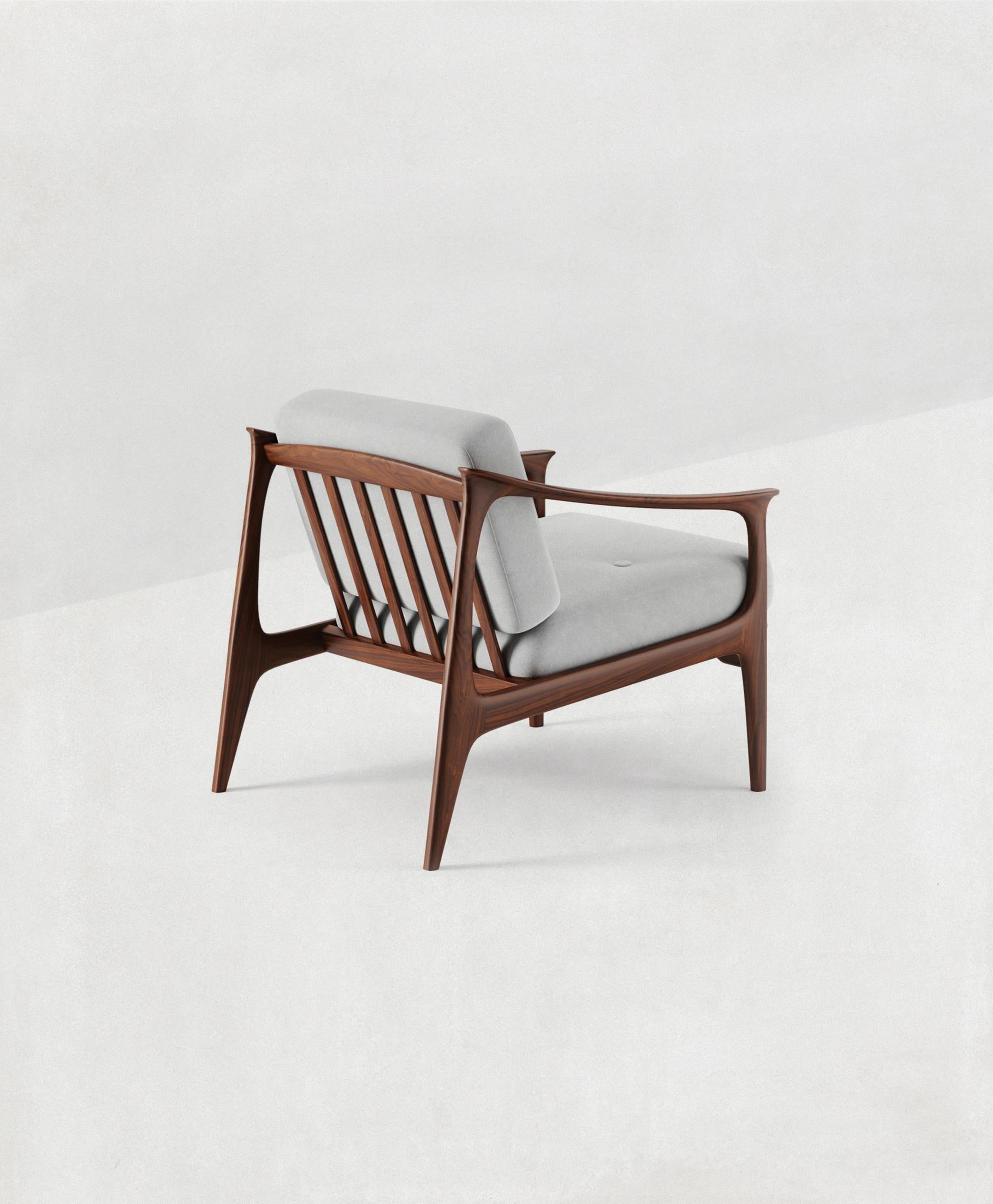 Quiete Armchair by Dale Italia
Dimensions: D 85 x W 66 x H 77 cm.
Materials: Walnut and upholstery.

Armchair in solid Canaletto walnut. Available in two finishes: natural and grey walnut. Different upholstery materials are available on request.