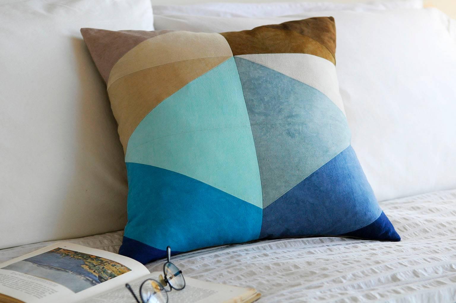 Vibrant New England colors in traditional American quilting patterns. 

With its distinct fabrics and careful, precise construction, each pillow is a stunning work of art. DUNN works closely with a fabric supplier and local quilter to Craft these