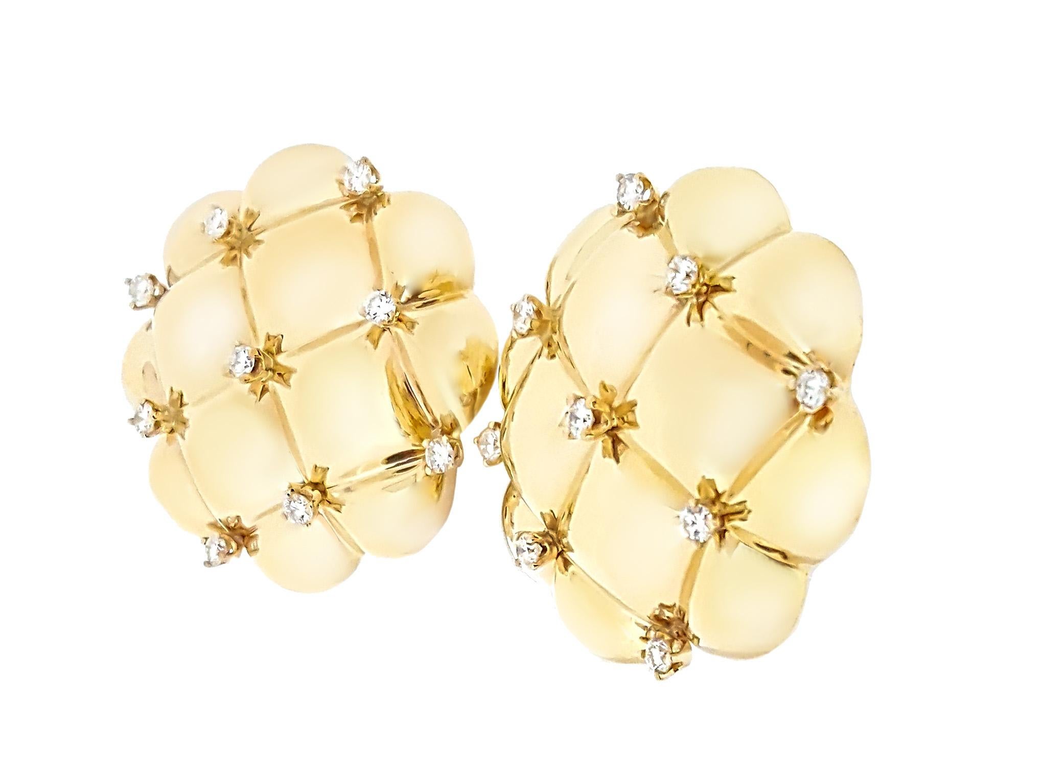 Beautiful and dimensional quilted pattern earrings with .90ctw of full cut round brilliant diamond accents set in high polished 14kt yellow gold. 
Earrings are approximately 1.5 inches wide and are clip on.  
Straight posts for pierced ears can be