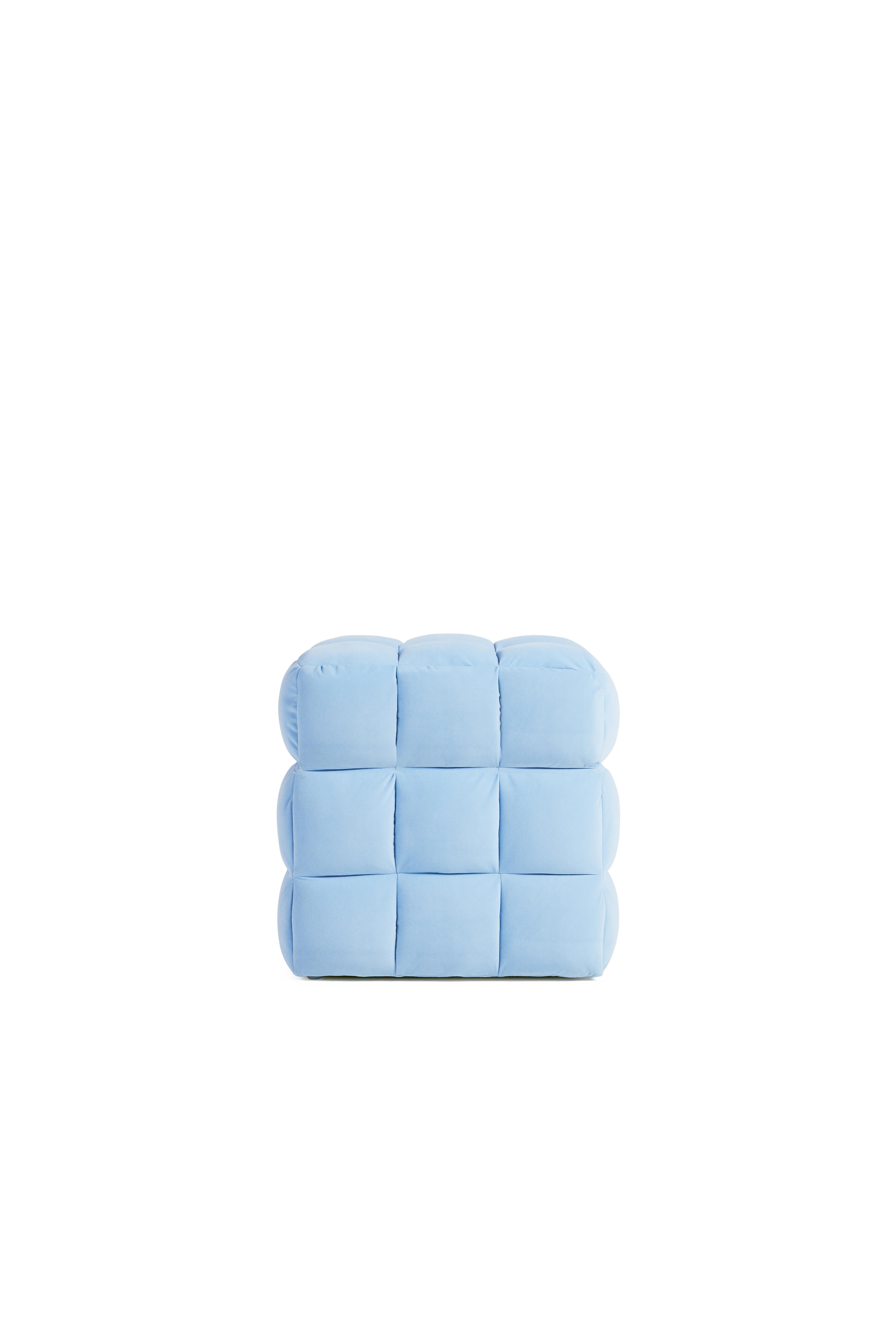 The Heal Stool is hand-made in Los Angeles. The perfect cube features evenly quilted squares that make up a lush and comfortable seating option. The comfy pouf comes in several color way spanning the entire color wheel. The dust cover features a