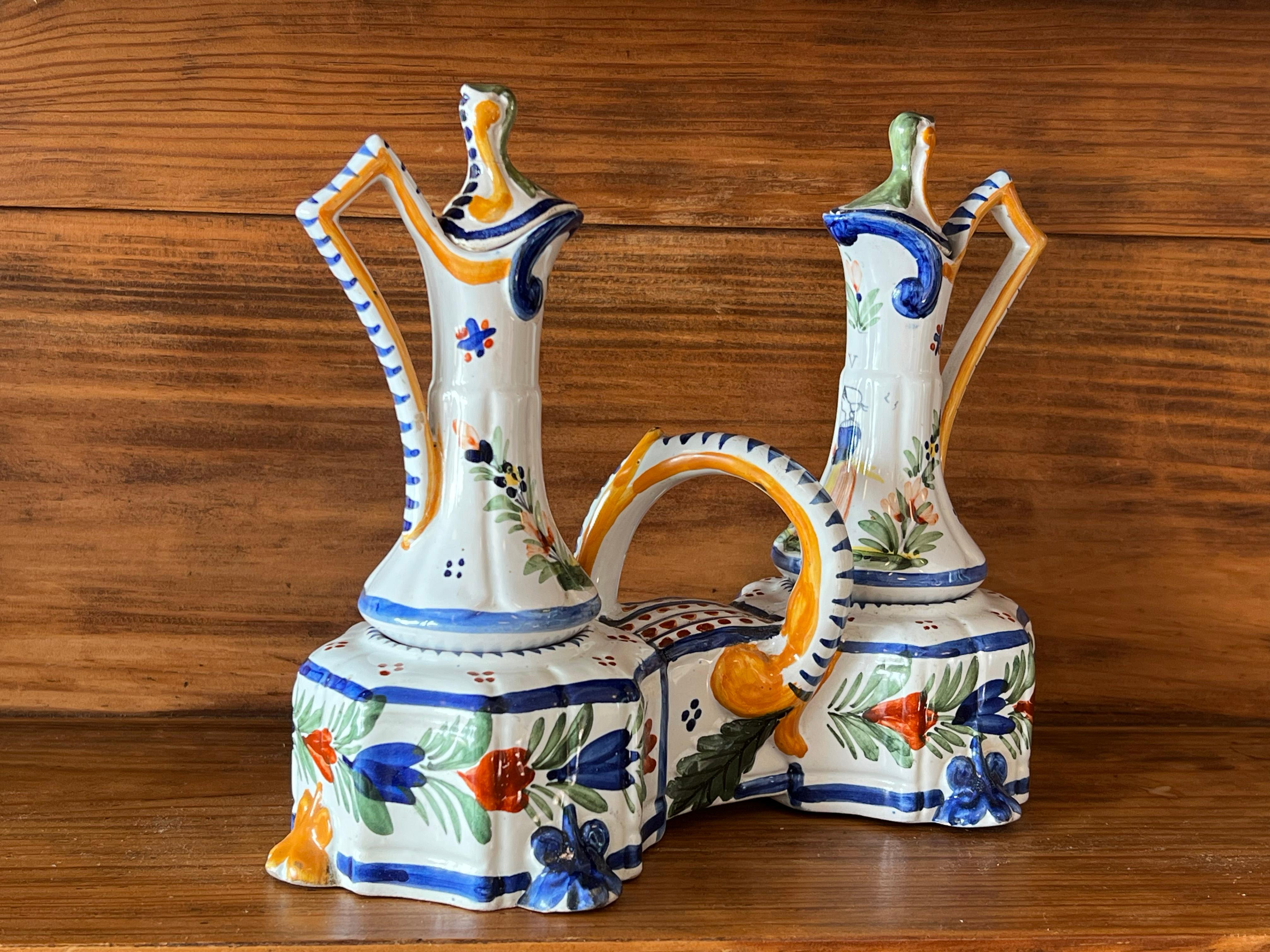 French Quimper earthenware oil and vinegar cruet set, late 19th century For Sale