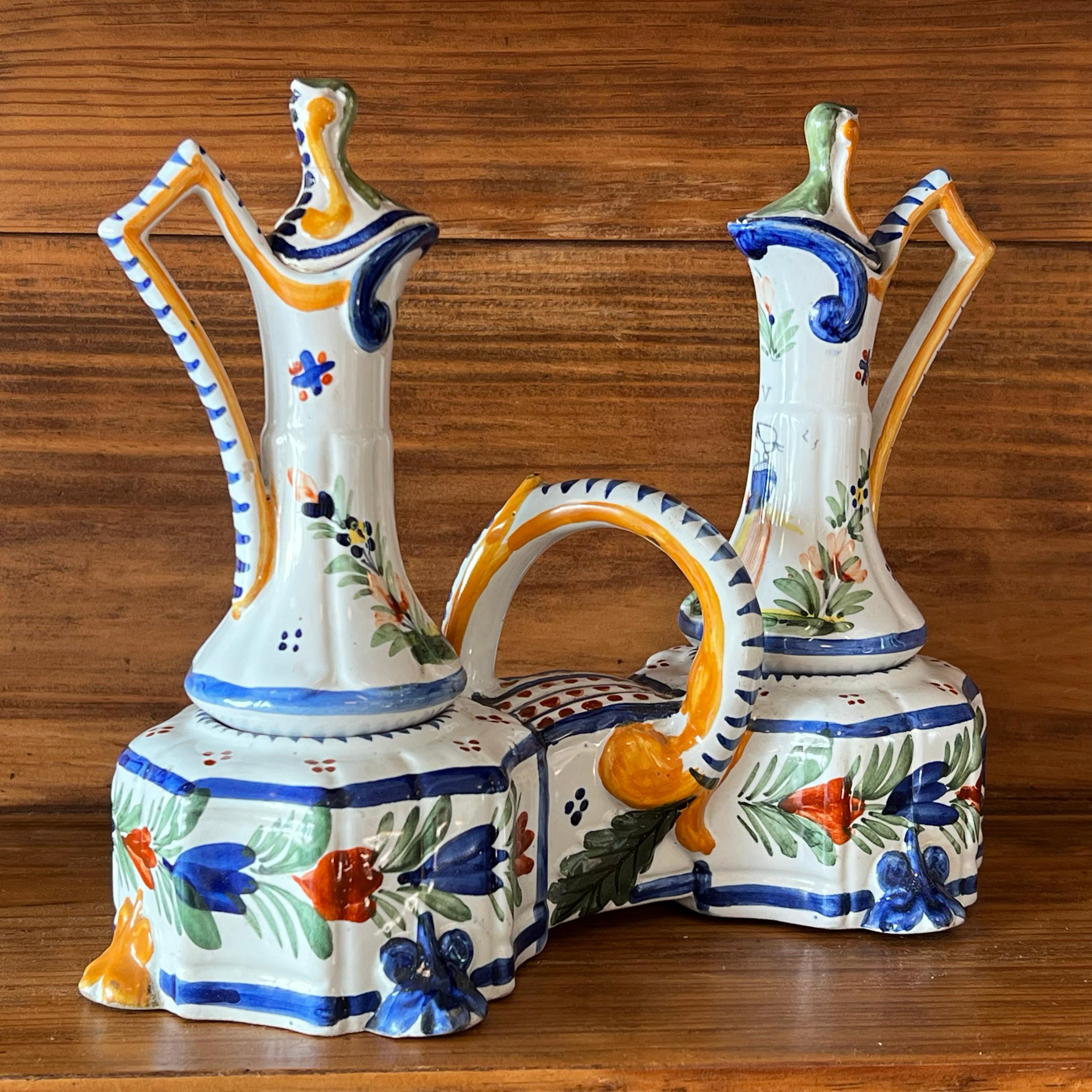 Fired Quimper earthenware oil and vinegar cruet set, late 19th century For Sale