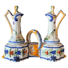 Quimper earthenware oil and vinegar cruet set, late 19th century