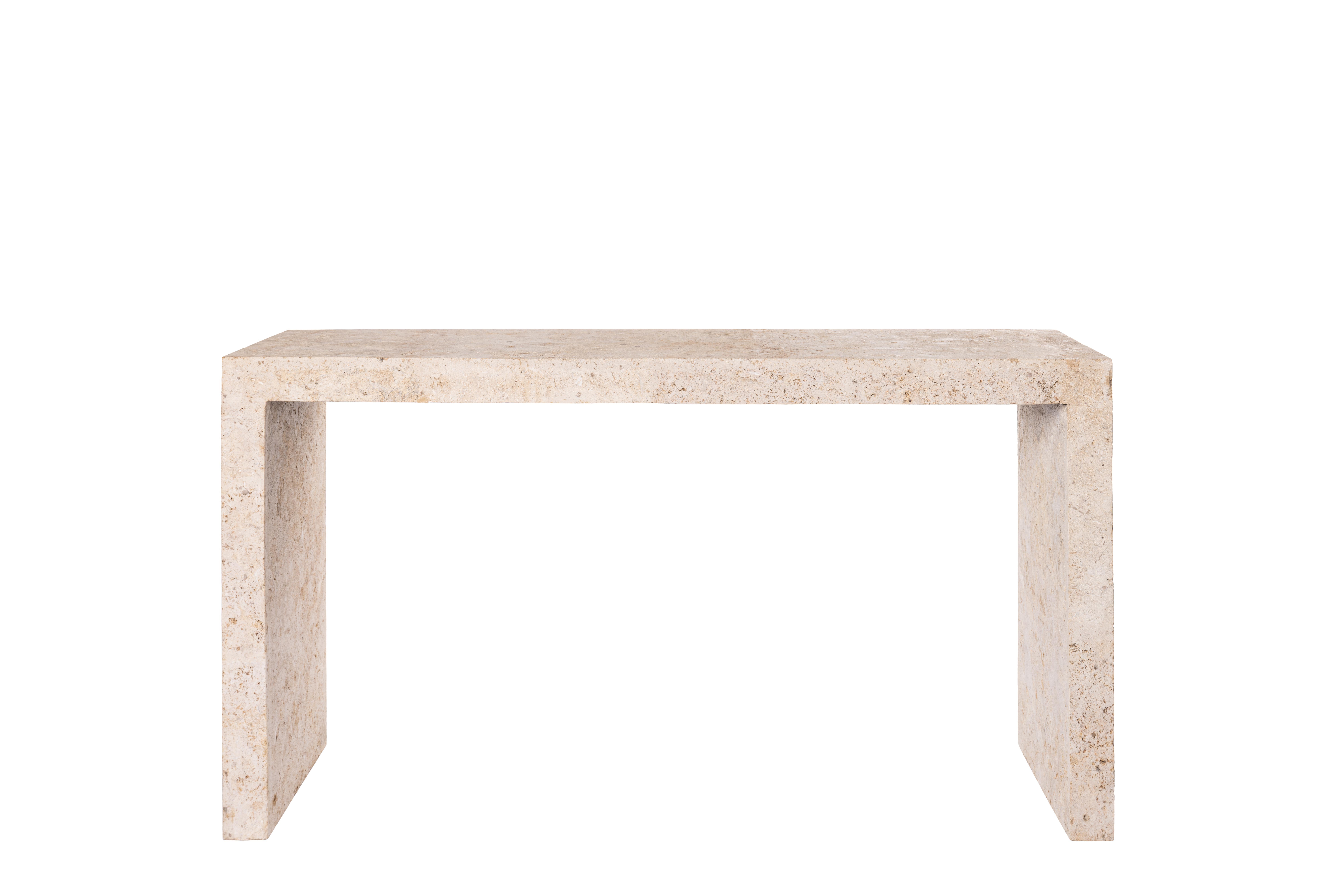 Crafted with a focus on elegant design, clean lines, and captivating materials, the Quincy Cocktail Table caters to those with discerning taste. Made from locally sourced Mactan stone, carefully harvested in the Philippines, this table seamlessly