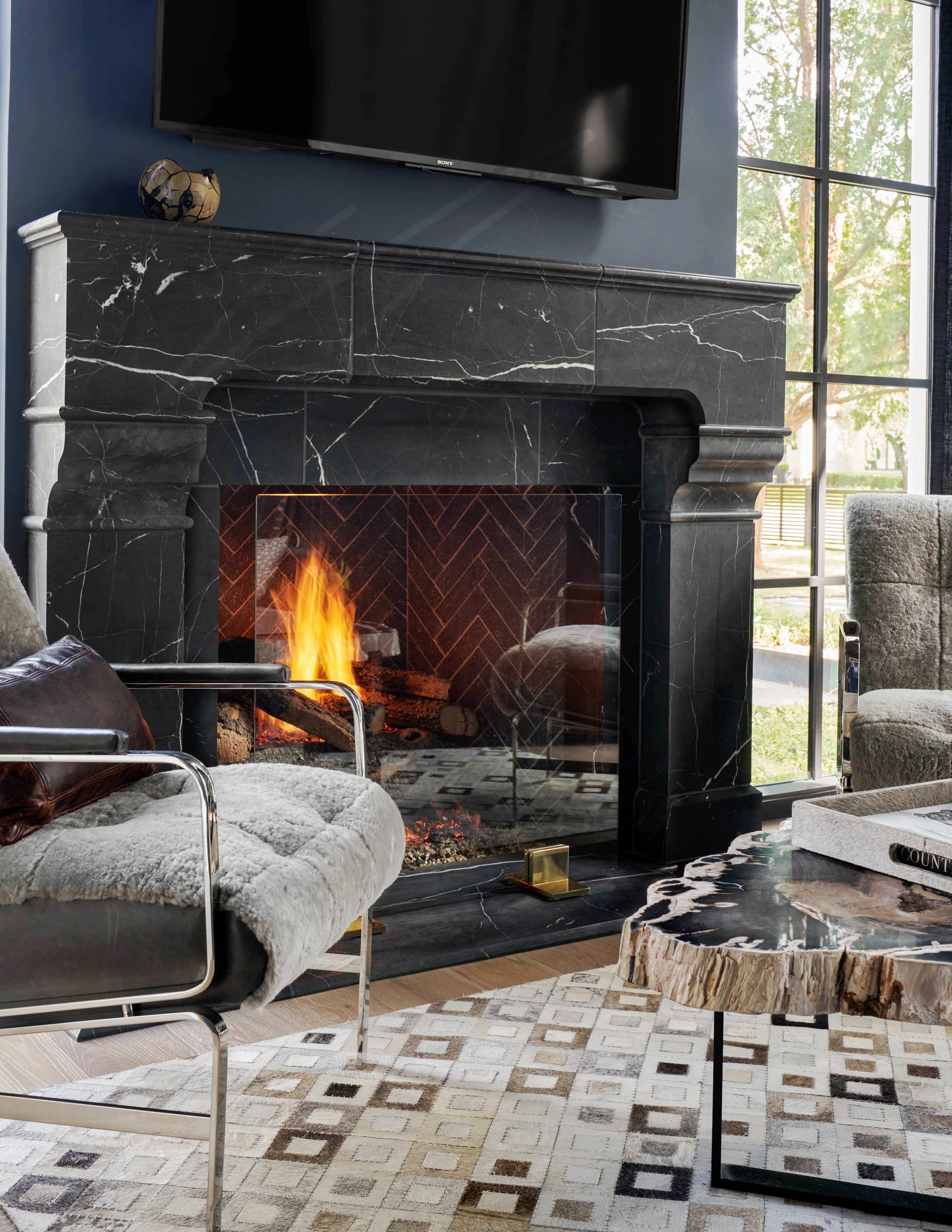 *Note: This screen is best for gas burning fireplaces only.

The Quinn Fireplace Screen's tempered glass panel allows the fire to be enjoyed while protecting the surrounding area from heat and sparks. The brass block feet provide elegant support for