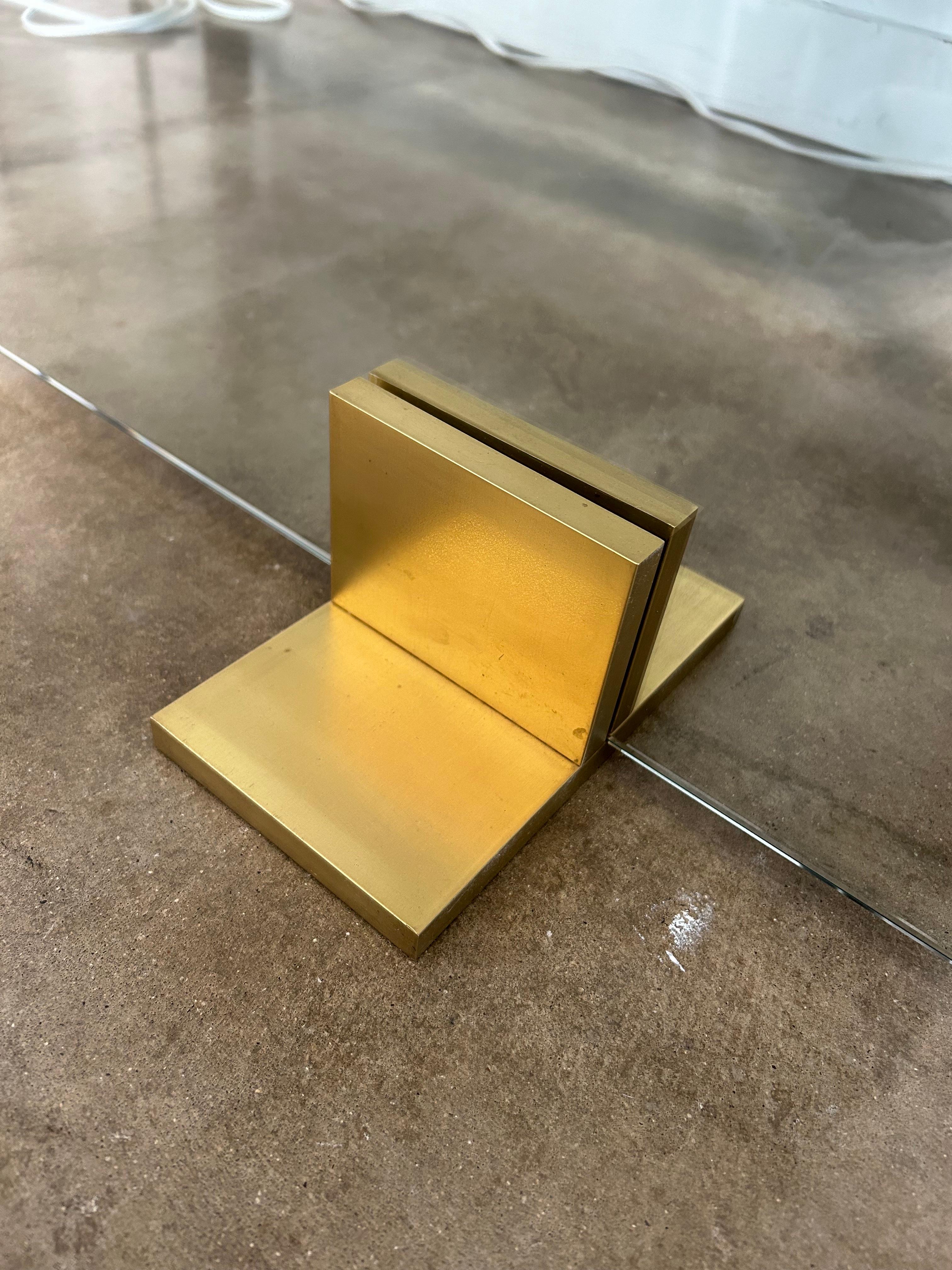 *Note: This screen is best for gas burning fireplaces only.

The Quinn Fireplace Screen's tempered glass panel allows the fire to be enjoyed while protecting the surrounding area from heat and sparks. The brass block feet provide elegant support for