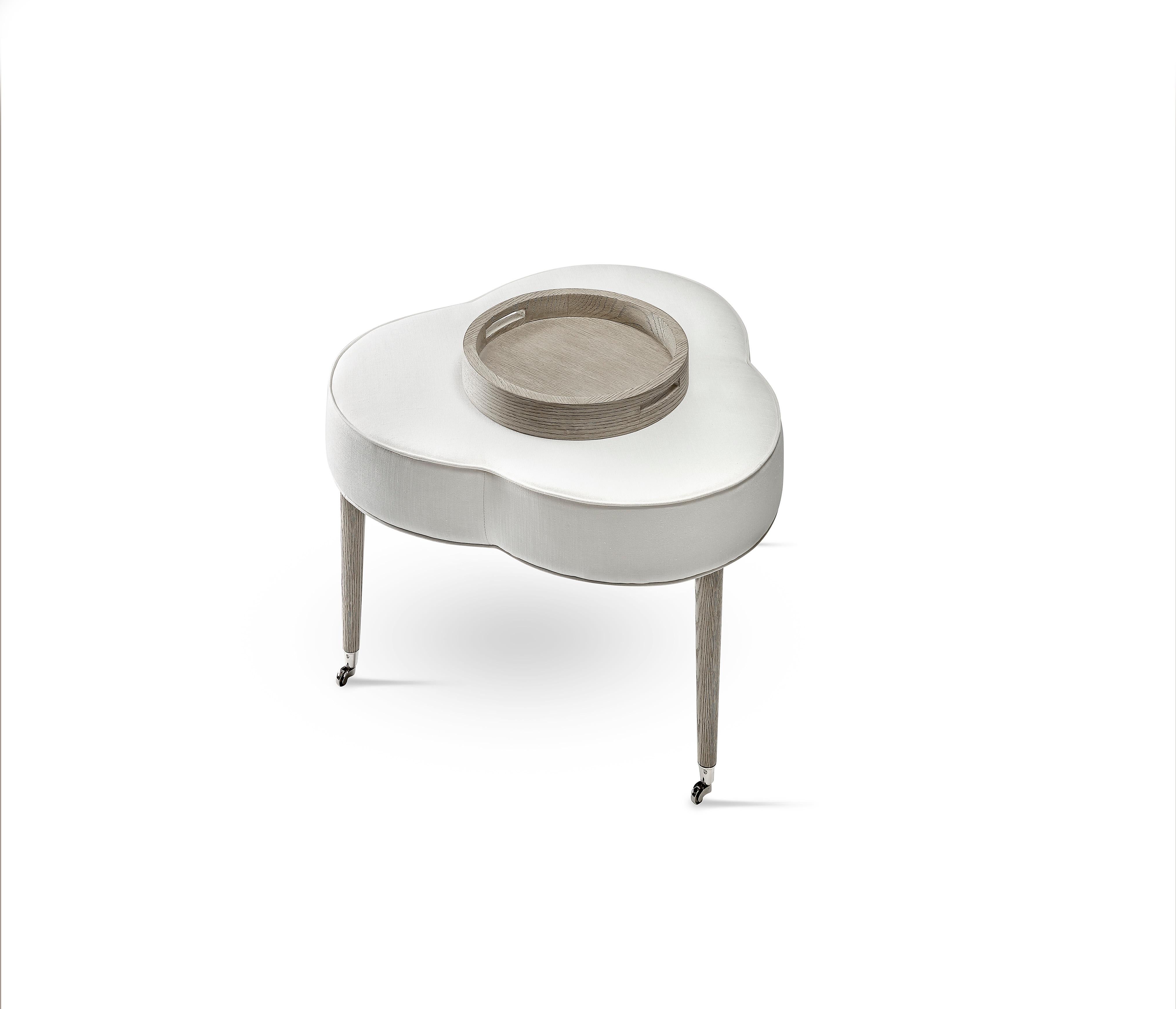 Contemporary upholstered ottoman
Wood: Maple
Dimensions: 32