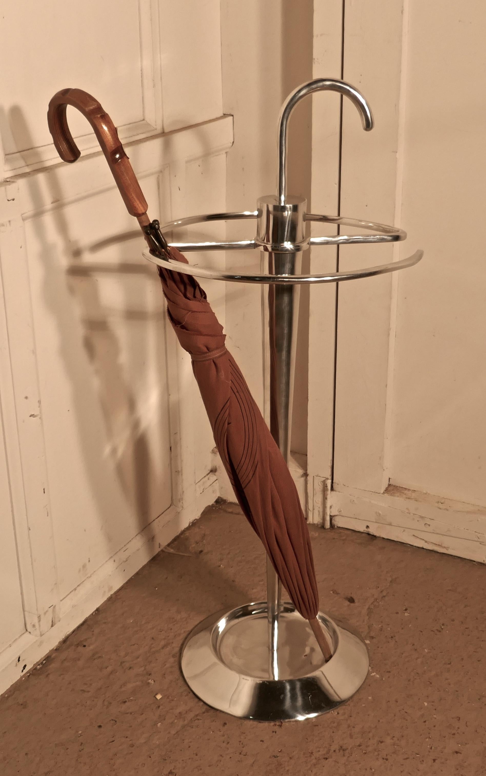 Quirky and Stylish Art Deco Chrome umbrella or stick stand

Great fun, the chrome umbrella, is an umbrella stand, the umbrella is made in tubular chrome, in the shape of and umbrella, it would work just as well as a walking stick stand
There is