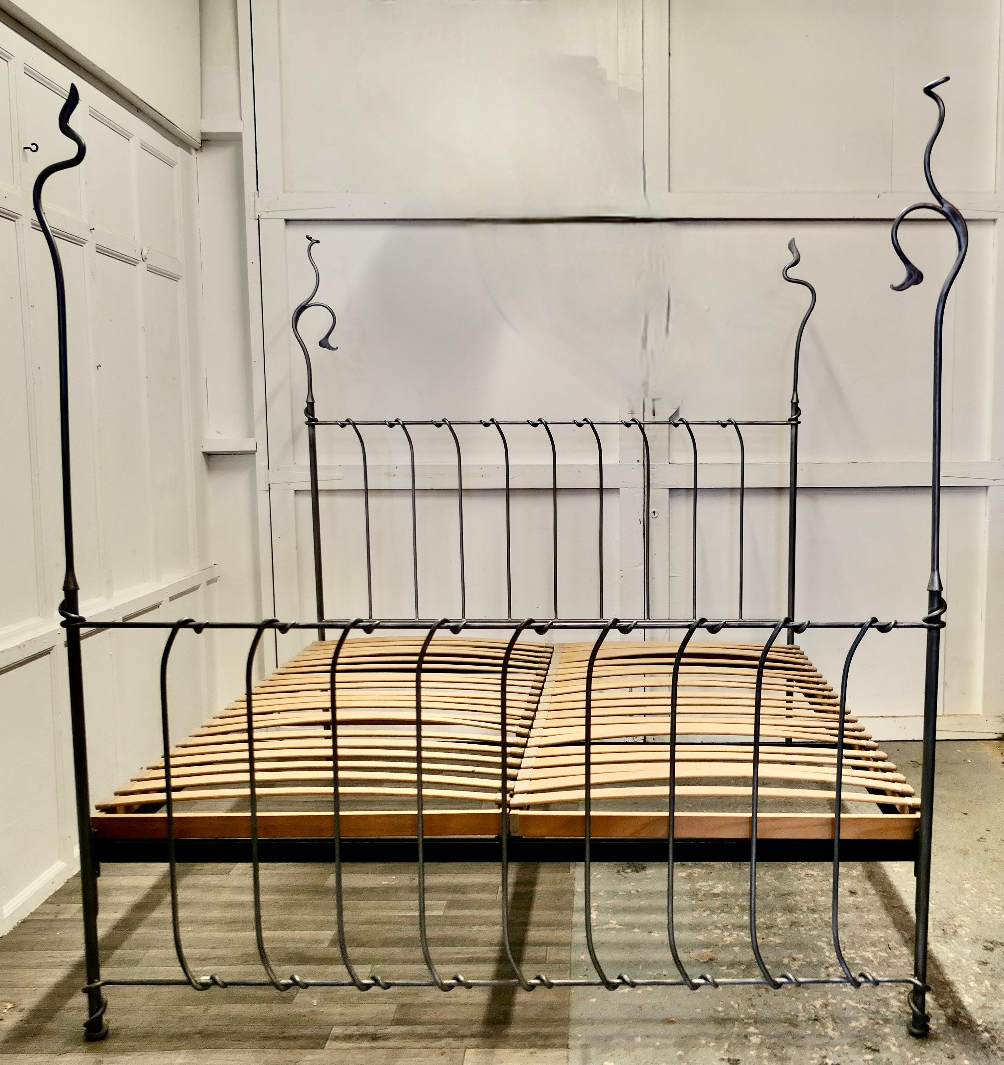 Quirky Designer Hand Forged Twisted Silver 6ft Iron 4 Post Bed 

A Fantasy bed in silver with off beat finials to the 4 posts this is a one off
This is a bespoke piece, superb in quality and individually handmade, it comes with a slatted base and