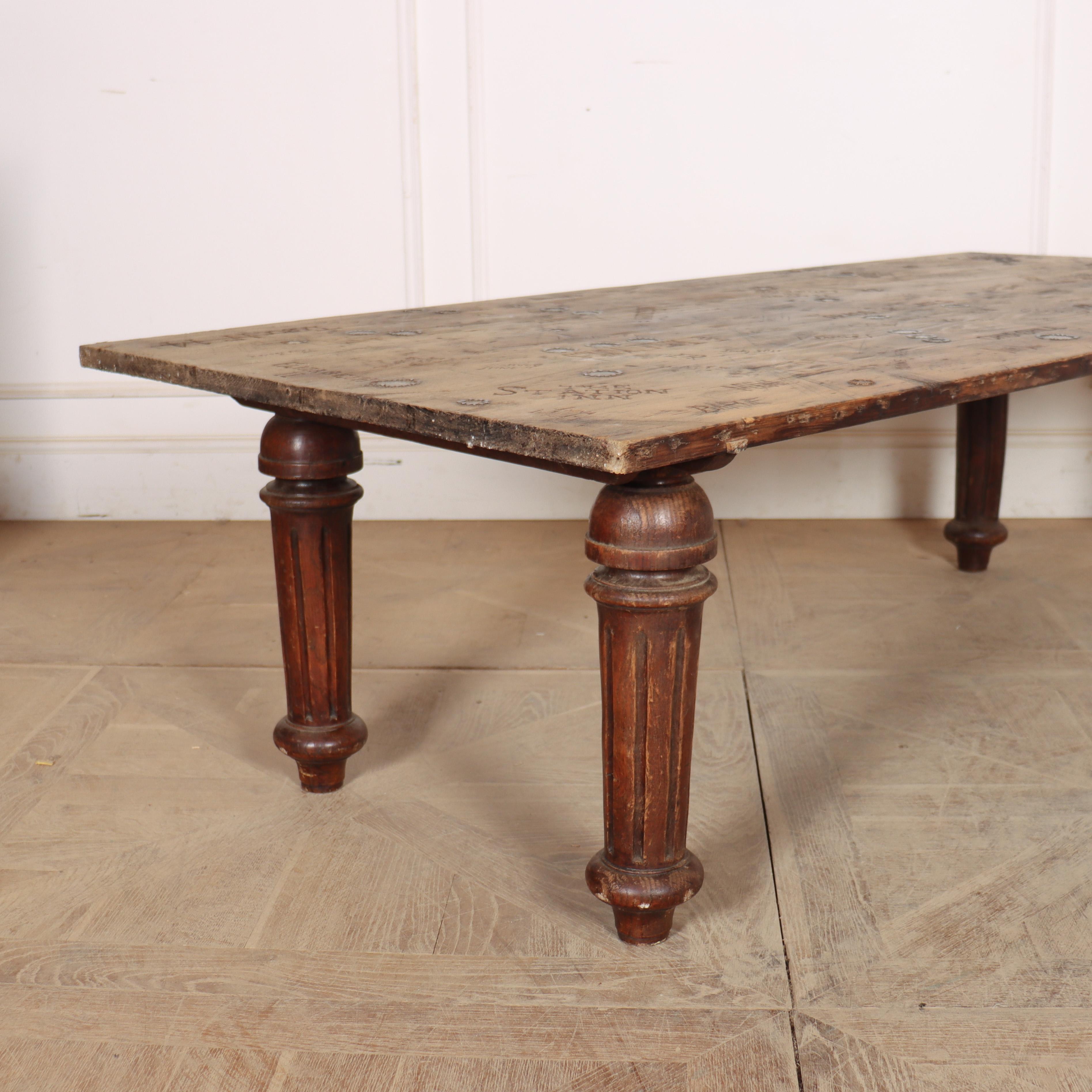 Quirky English oak coffee table with a graffiti top, made from 19th century components. 1890.

Code: 9102

Dimensions:
W: 68