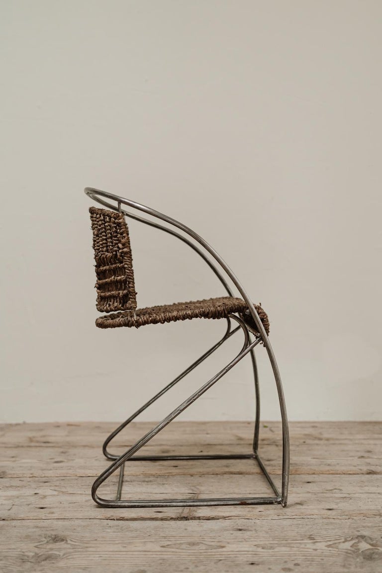 Quirky Iron/Rattan Chair For Sale at 1stDibs