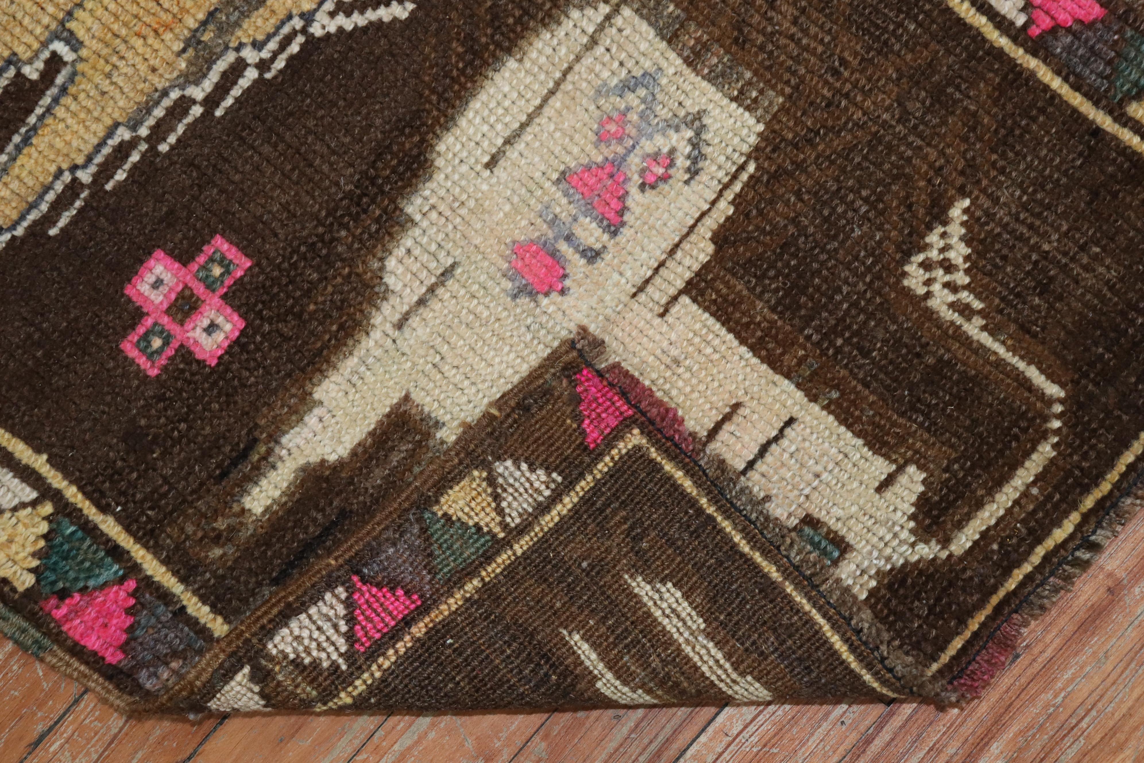 A late 20th century Turkish rug depicting 2 lions on a chocolate brown field.

Measures: 1'10