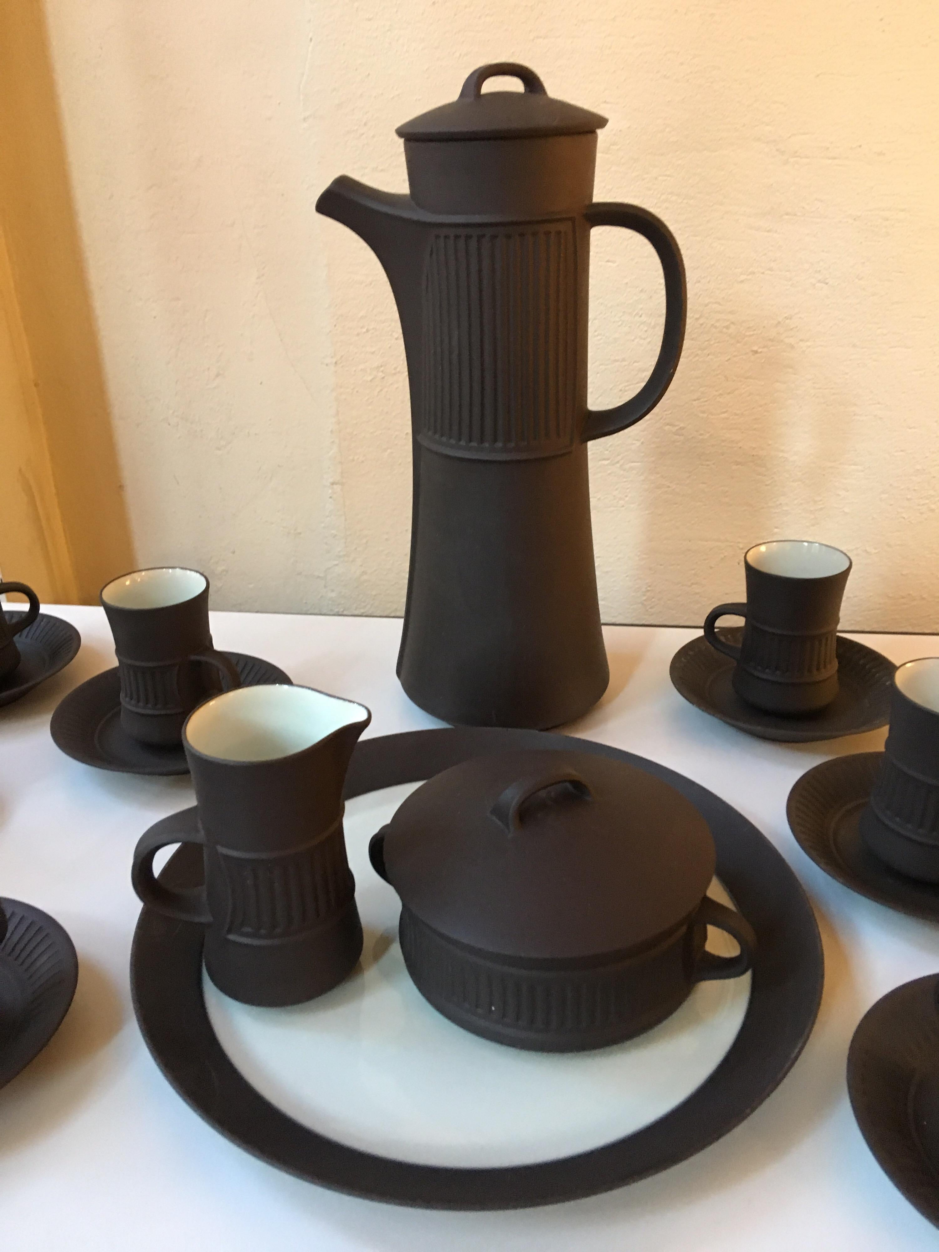 Quistgaard for Dansk Flamestone Ironstone coffee/ espresso set, 6 coffee cups/saucers are available as well. Set includes tall coffee pot, cream and sugar, 1 plate, and 8 espresso cups and saucers and 1 extra coffee pot lid. Design is from 1958,