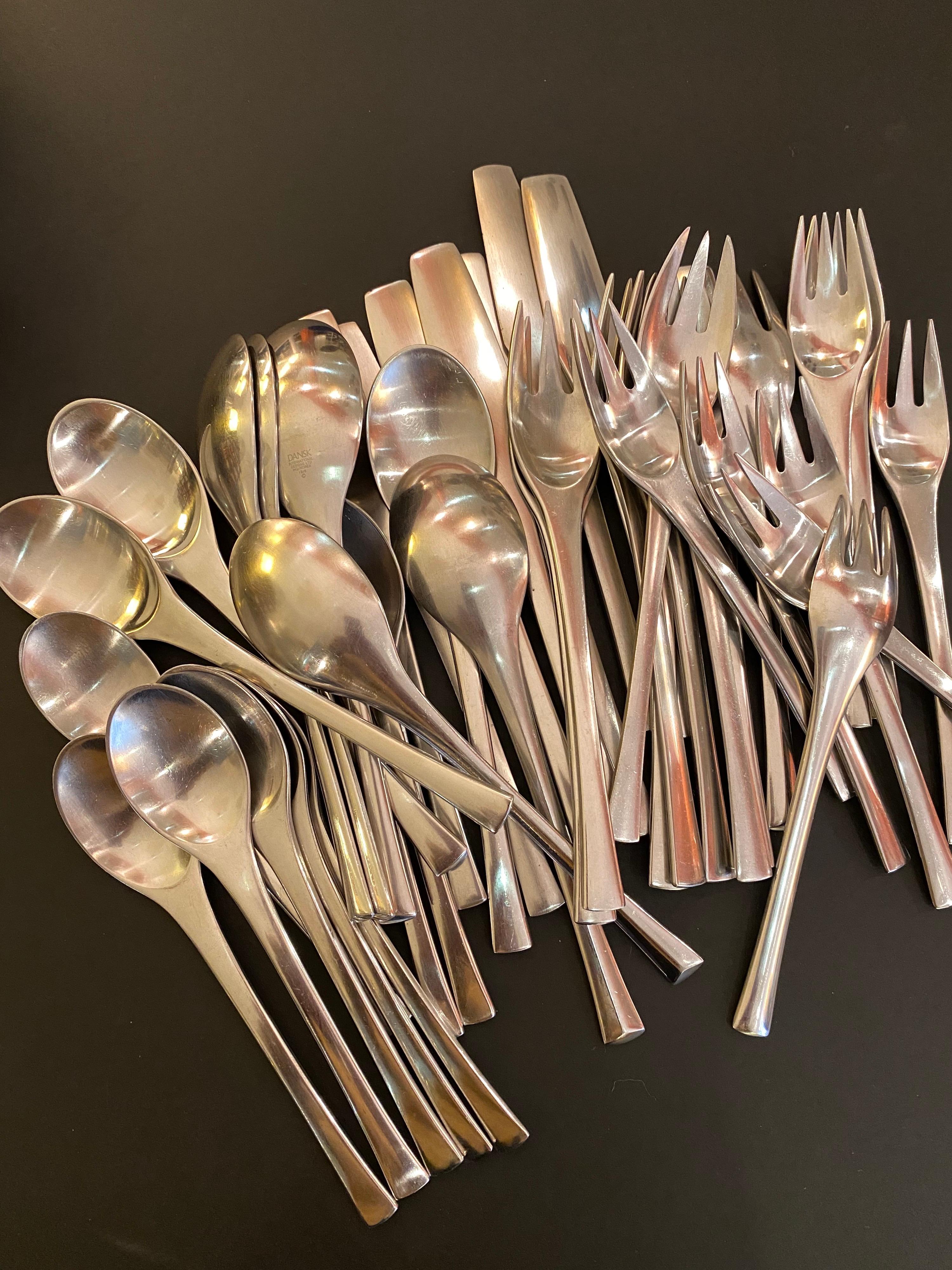 Dansk Odin flatware designed by Jens Quistgaard and manufactured in Germany and Korea. Listing includes service for 8. Stainless is in a Satin finish. Nice weight and Scale to pieces! One of my favorite designs from Quistgaard.