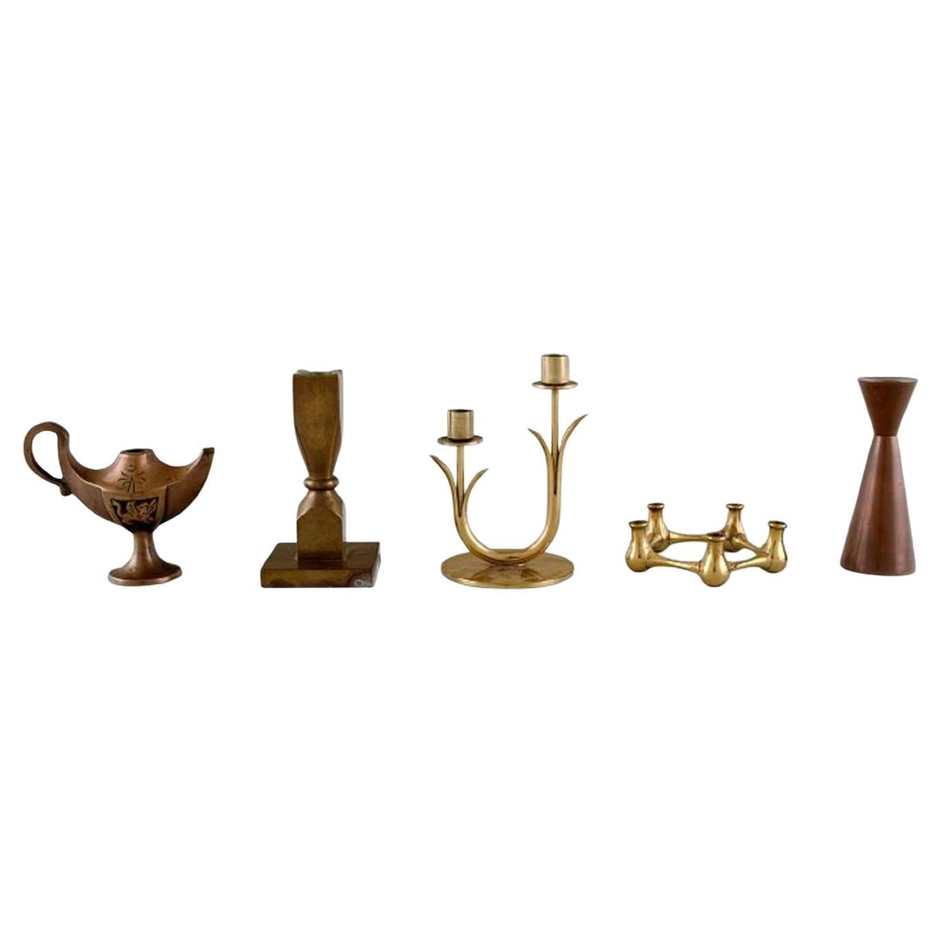 Quistgaard, Gusum, Ystad Metall Et Al, Oil Lamp and Four Candlesticks in Brass For Sale